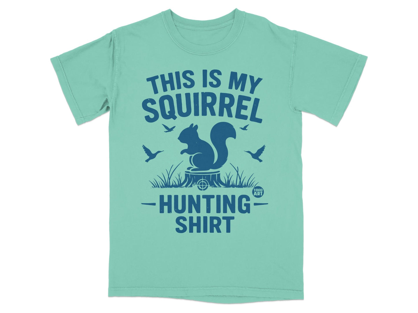 Mint green t-shirt with squirrel, tree stump, and birds graphic.