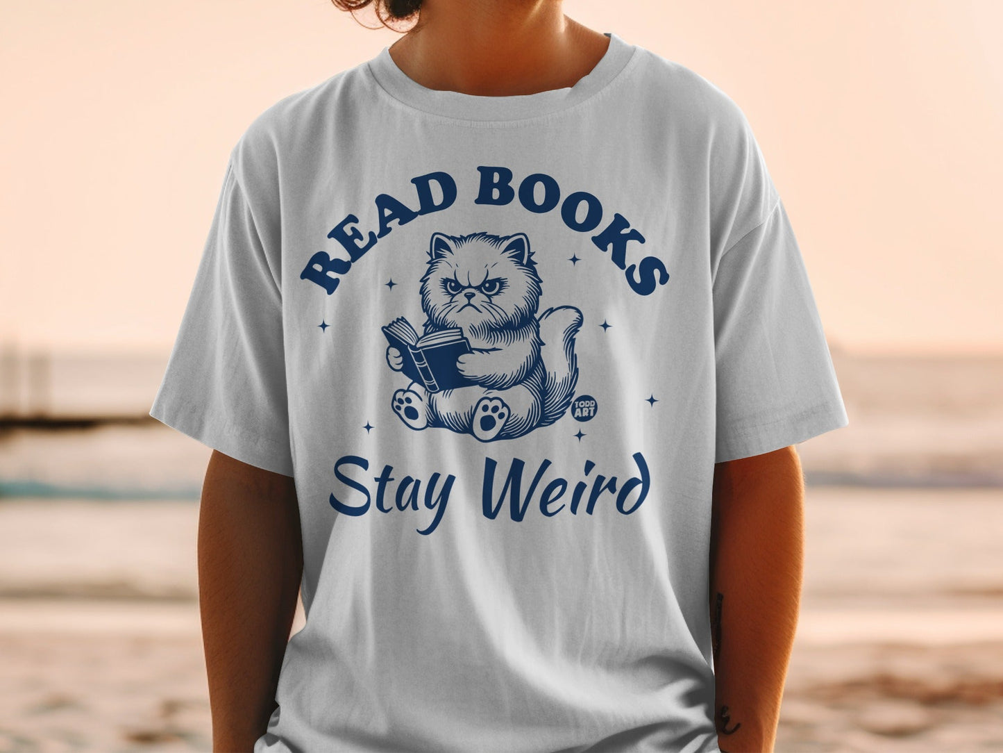 Read Books Stay Weird Graphic T-shirt with Cute Cat Design