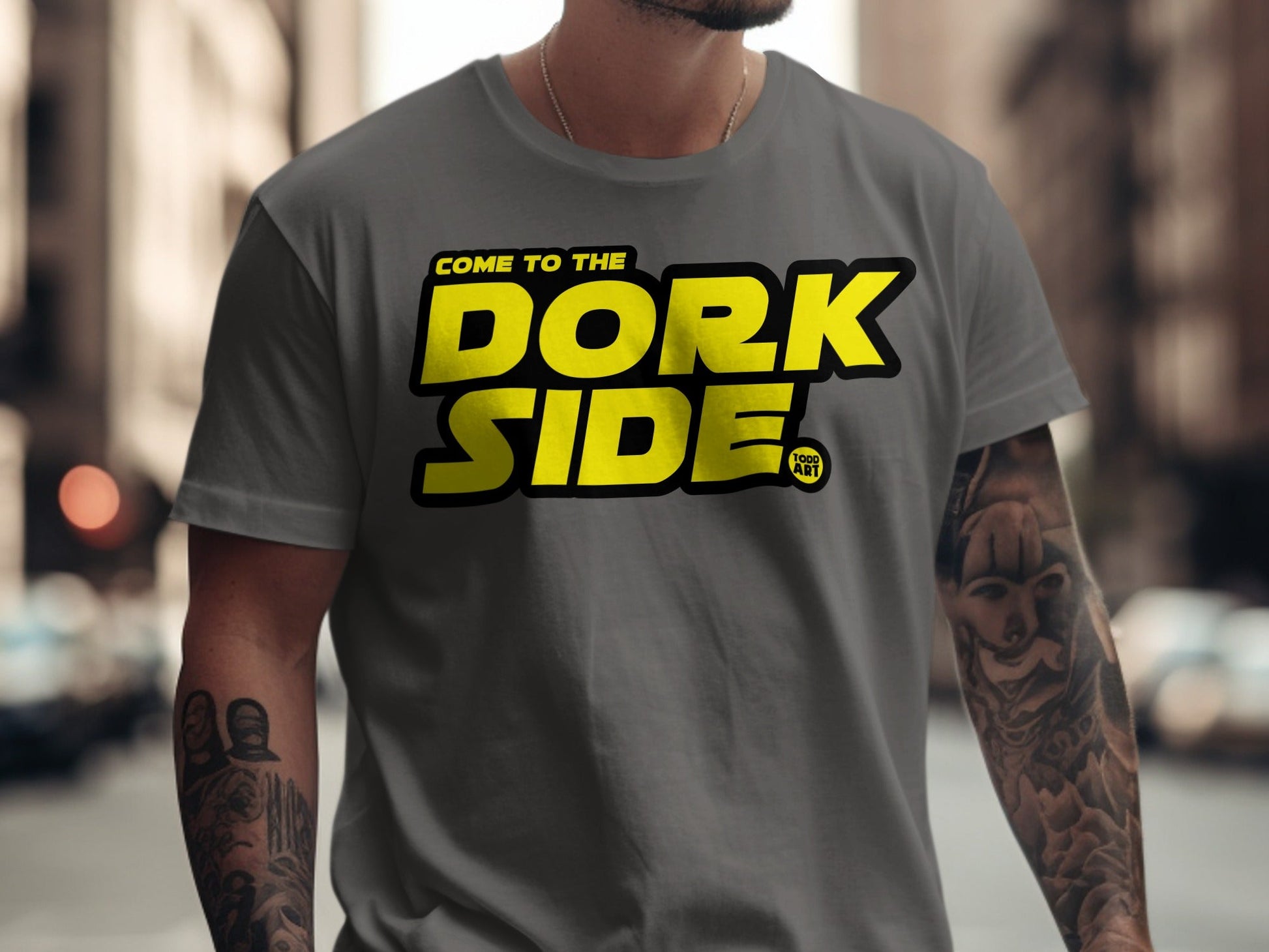 Grey t-shirt with yellow and black text reading "Come to the DORK SIDE."