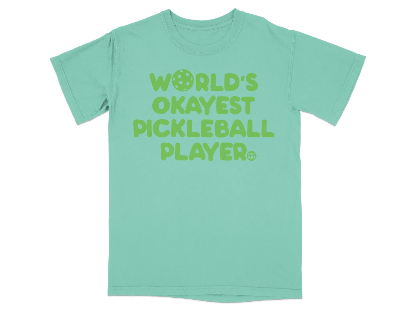 Green t-shirt with "WORLD'S OKAYEST PICKLEBALL PLAYER" text.