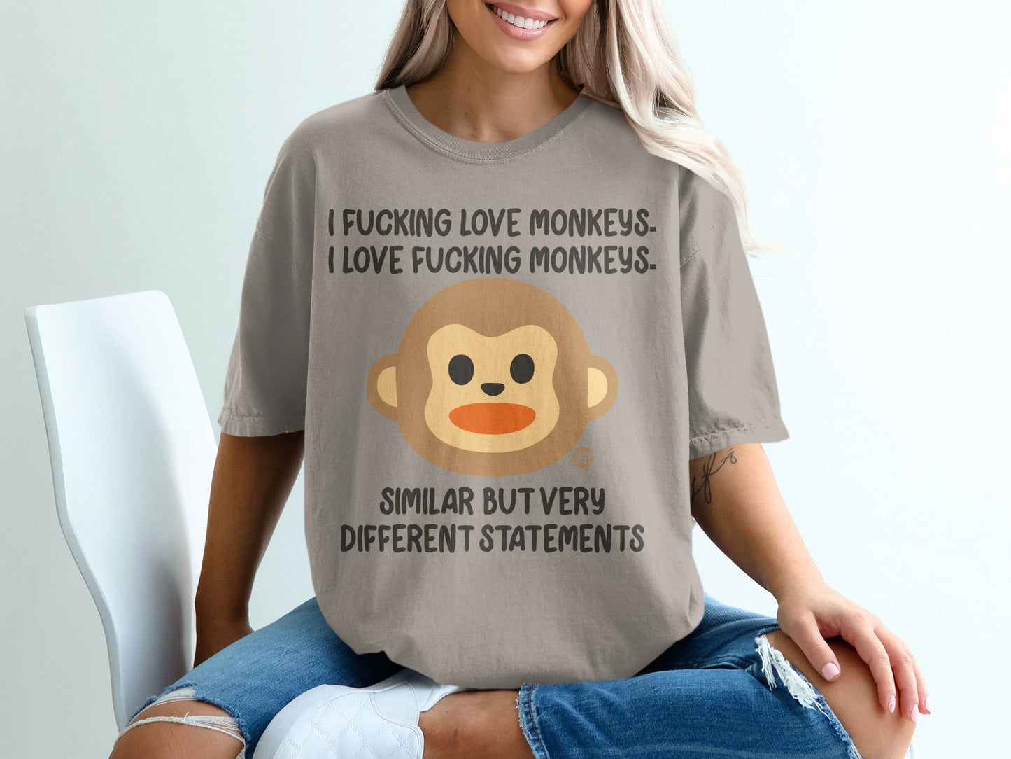 T-shirt with monkey graphic and text "I FUCKING LOVE MONKEYS. I LOVE FUCKING MONKEYS. SIMILAR BUT VERY DIFFERENT STATEMENTS."
