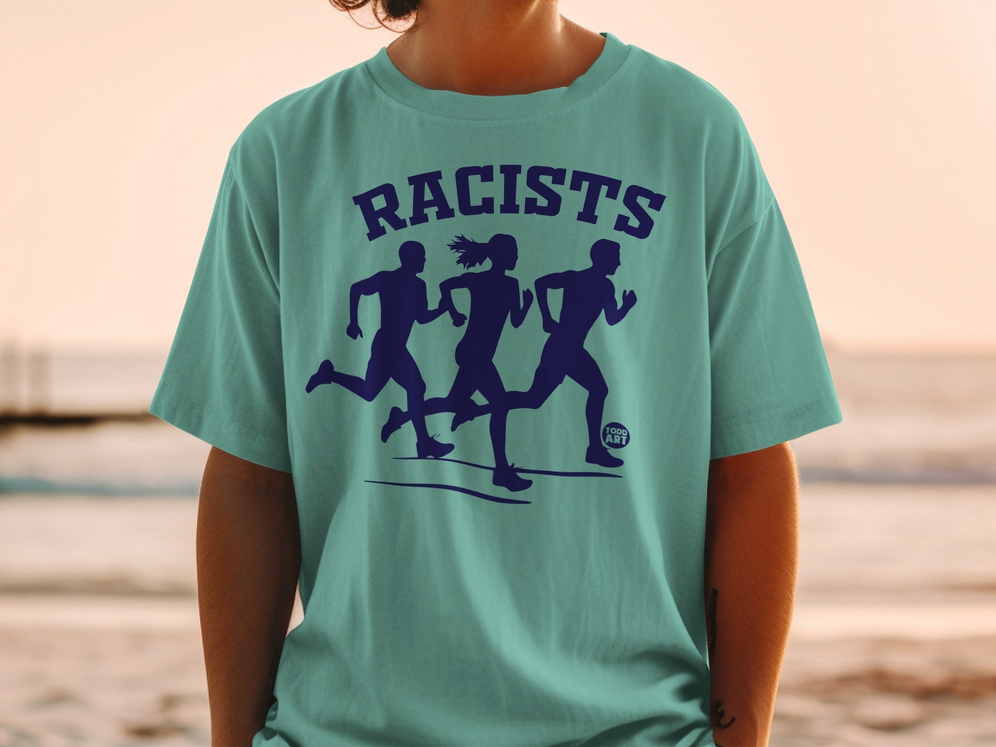 Teal t-shirt with "RACISTS" and three running silhouettes.