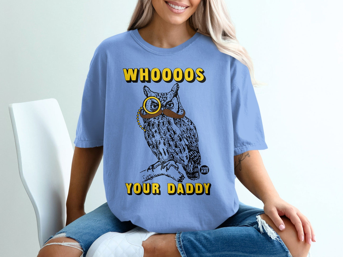Blue t-shirt with owl wearing monocle and mustache, text "WHOOOOS YOUR DADDY".