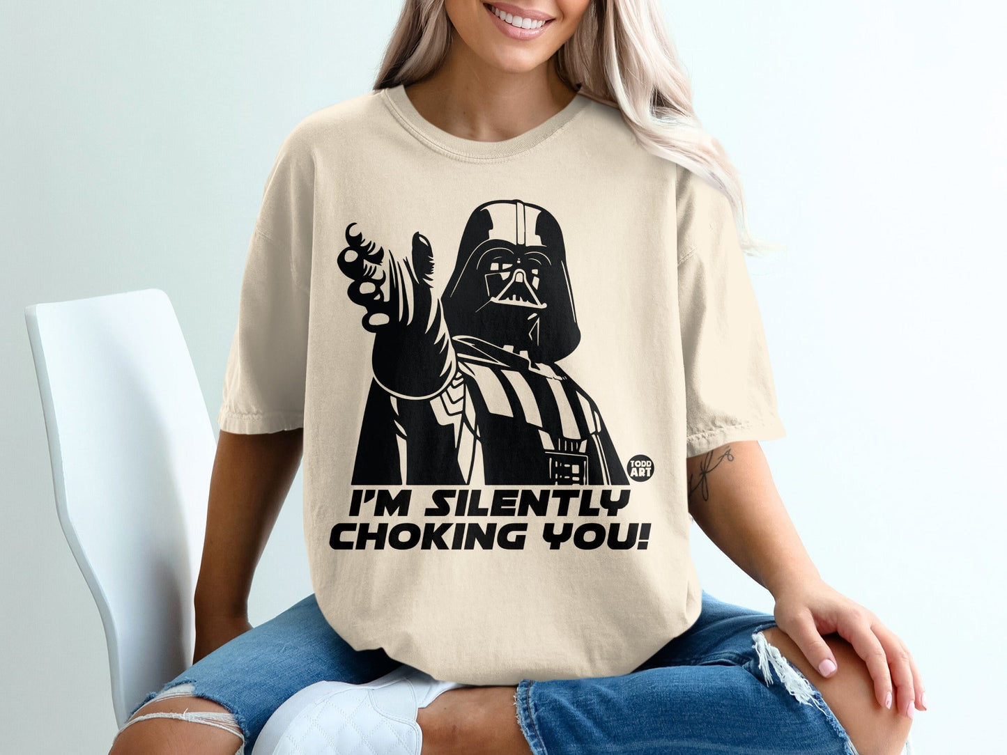 Darth Vader pointing, wearing a beige t-shirt with "I'M SILENTLY CHOKING YOU!" text.