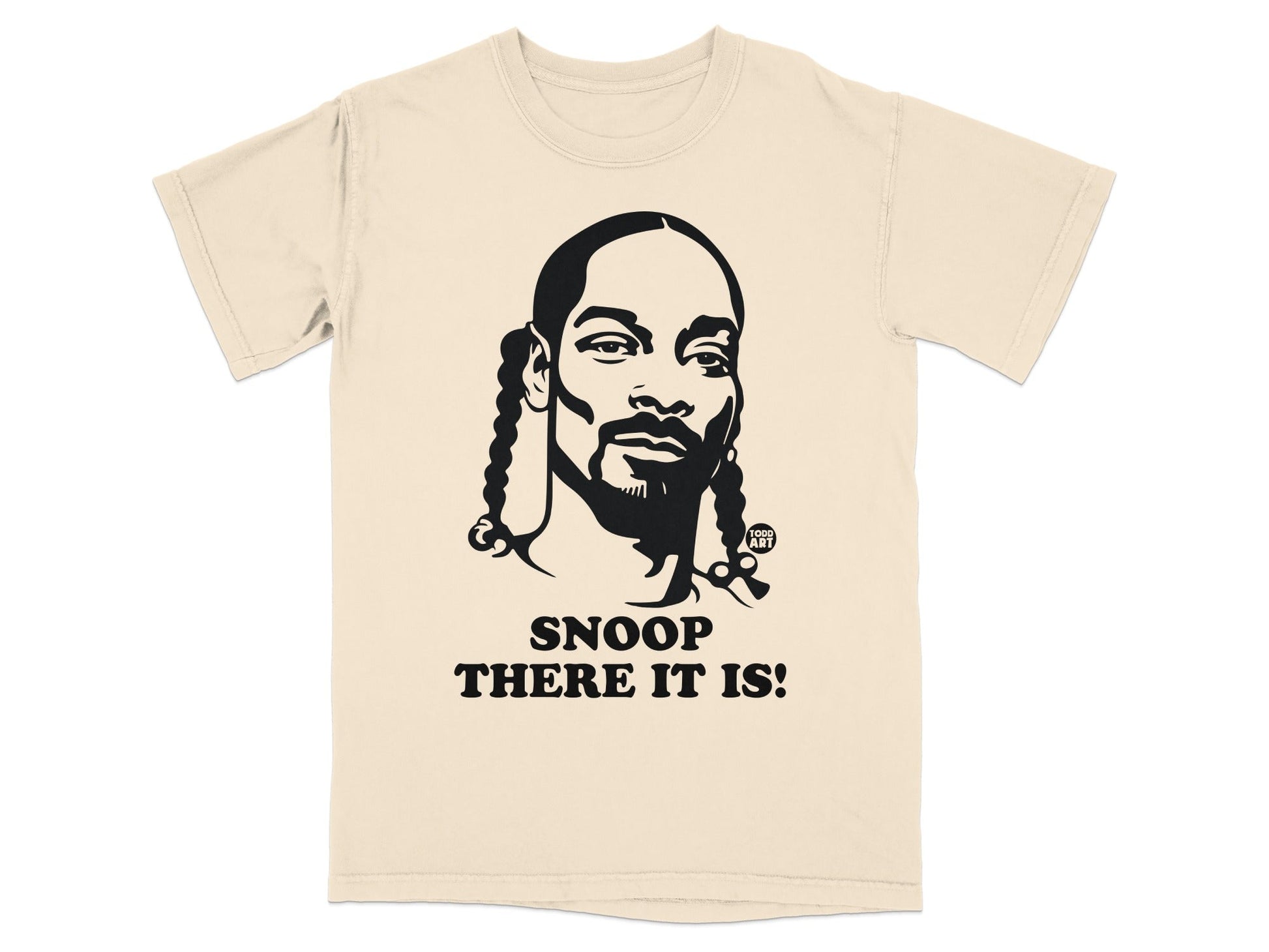 Cream t-shirt featuring a black graphic of Snoop Dogg with "Snoop There It Is!" text.