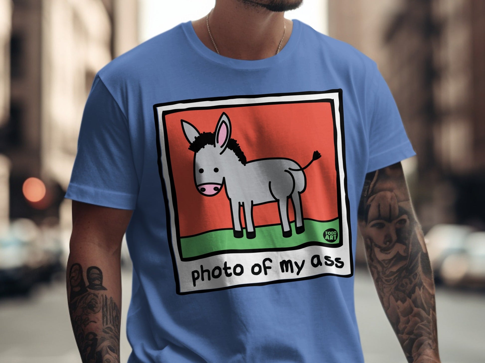 Cartoon donkey in a frame with "photo of my ass" text.