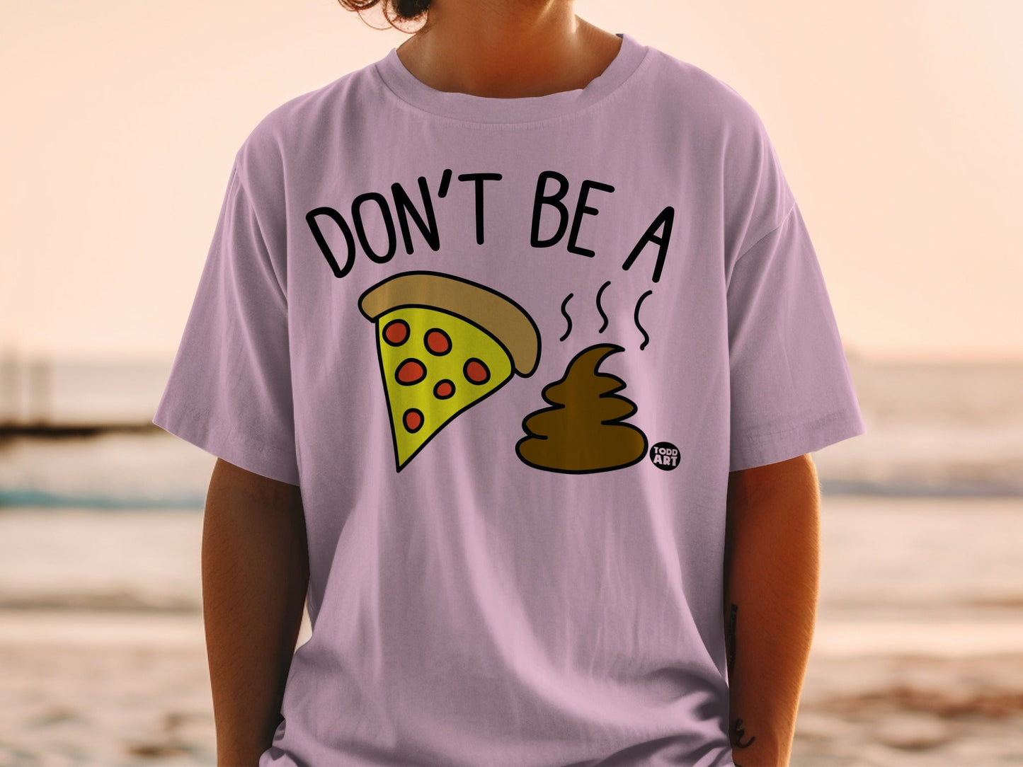 Purple t-shirt with "DON'T BE A" text and cartoon slice of pizza and poop.