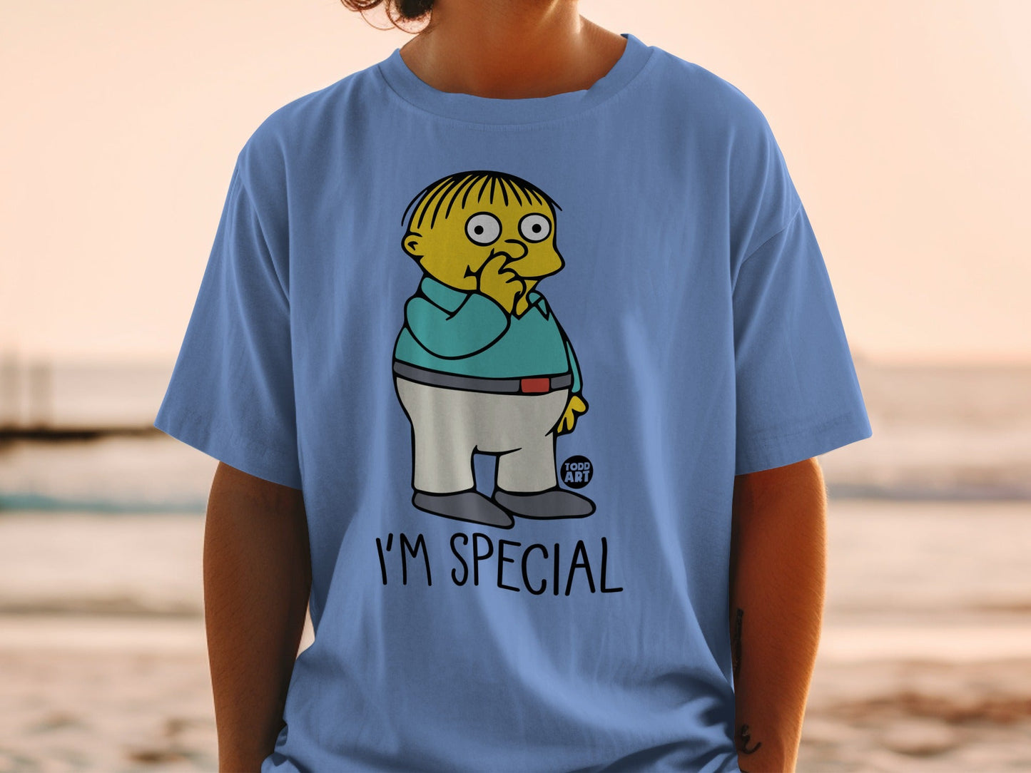 Ralph Wiggum from The Simpsons wearing a blue shirt and white pants, with text "I'M SPECIAL".