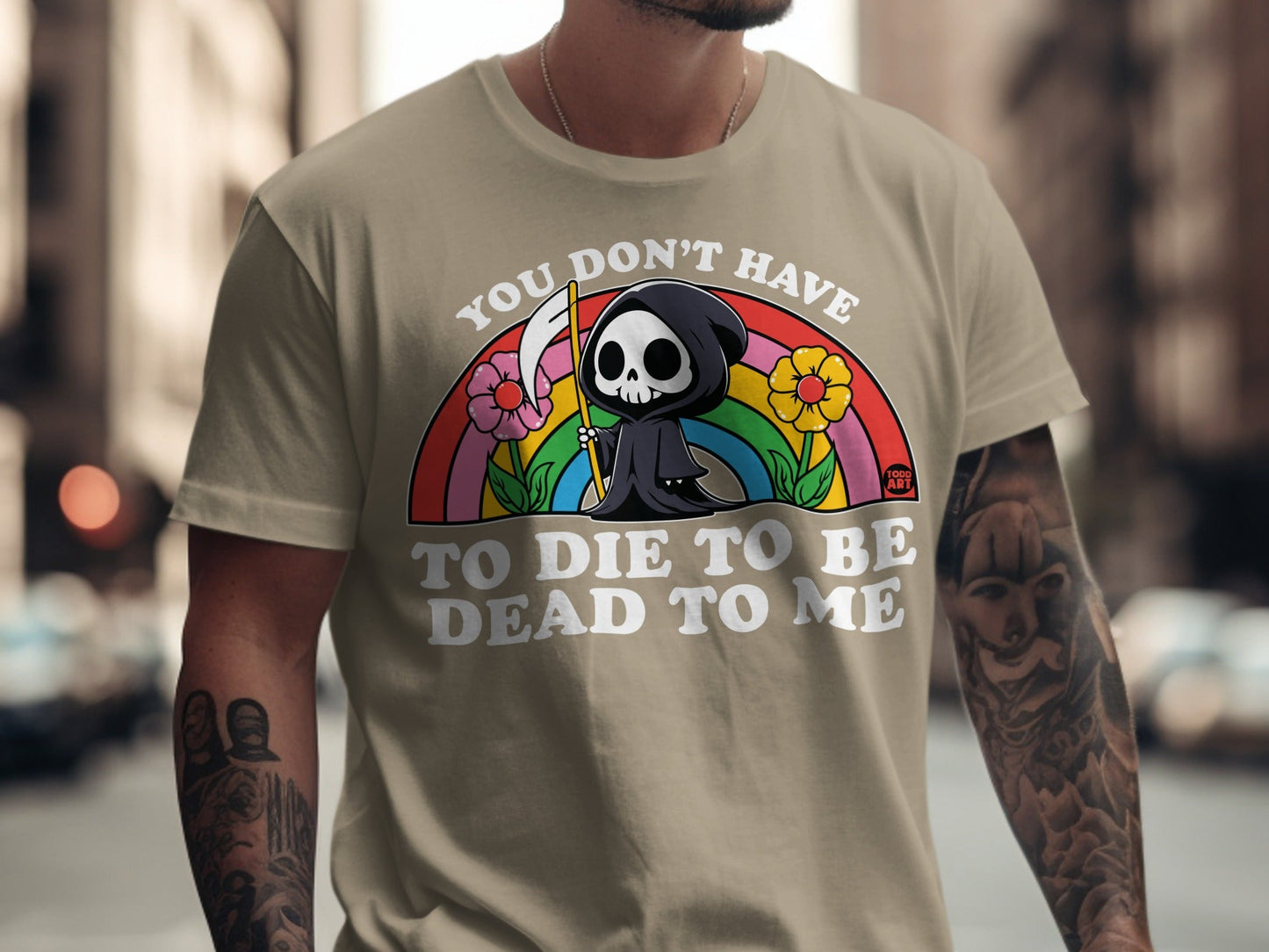 Grim reaper with flowers and rainbow, text reads "You don't have to die to be dead to me."