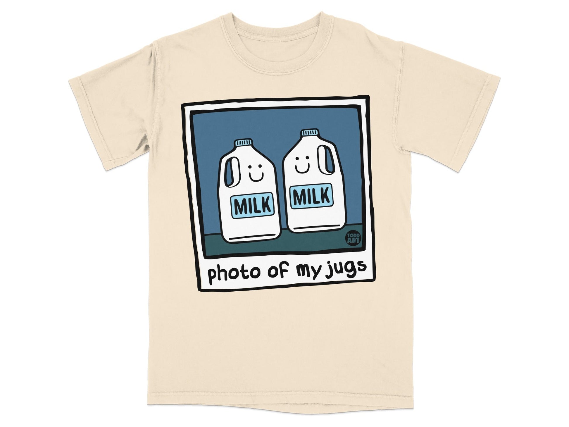 Two milk jugs with smiling faces labeled "MILK" on a cream t-shirt.