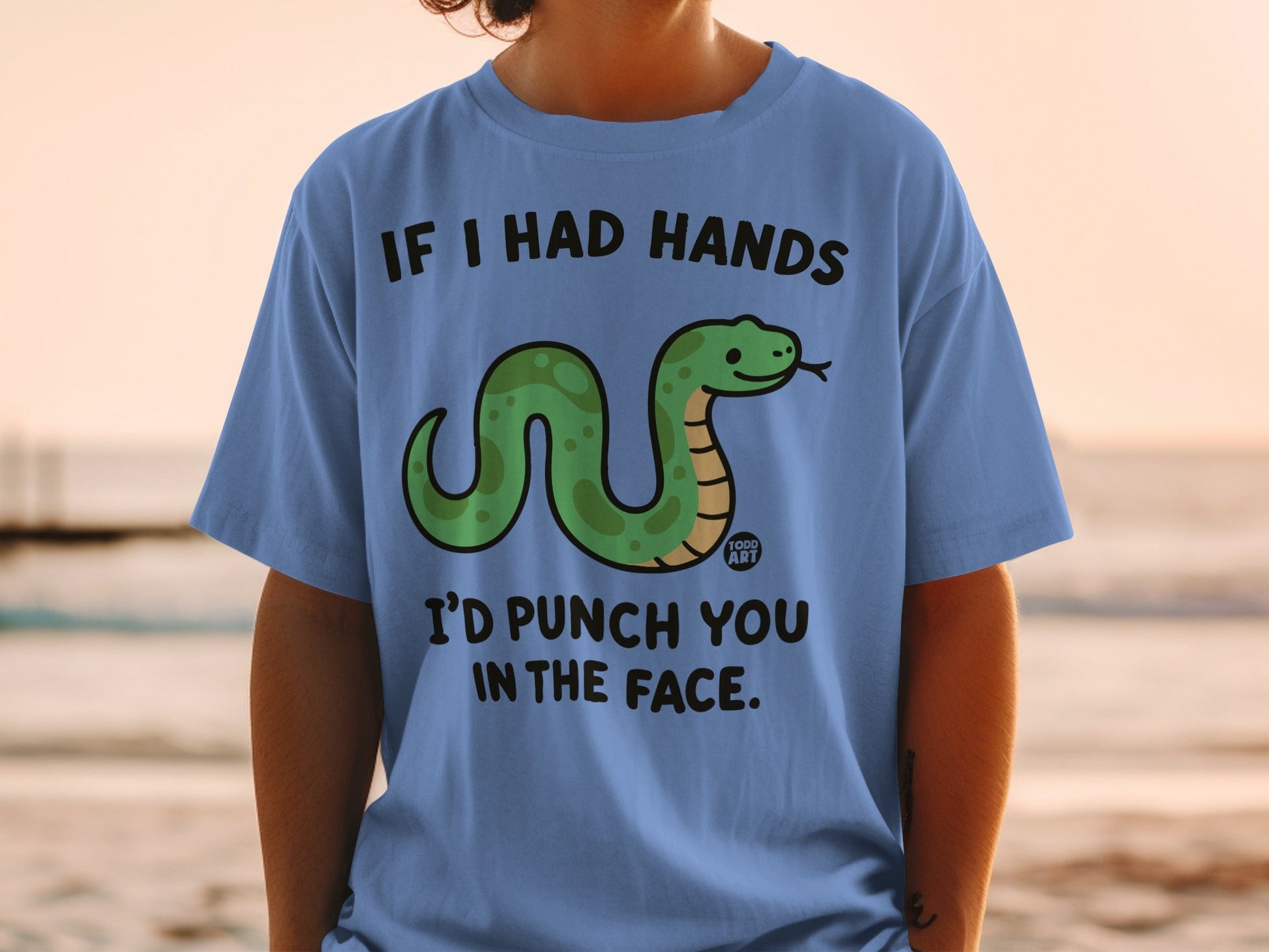 Light blue t-shirt with green snake and text "If I had hands I'd punch you in the face."