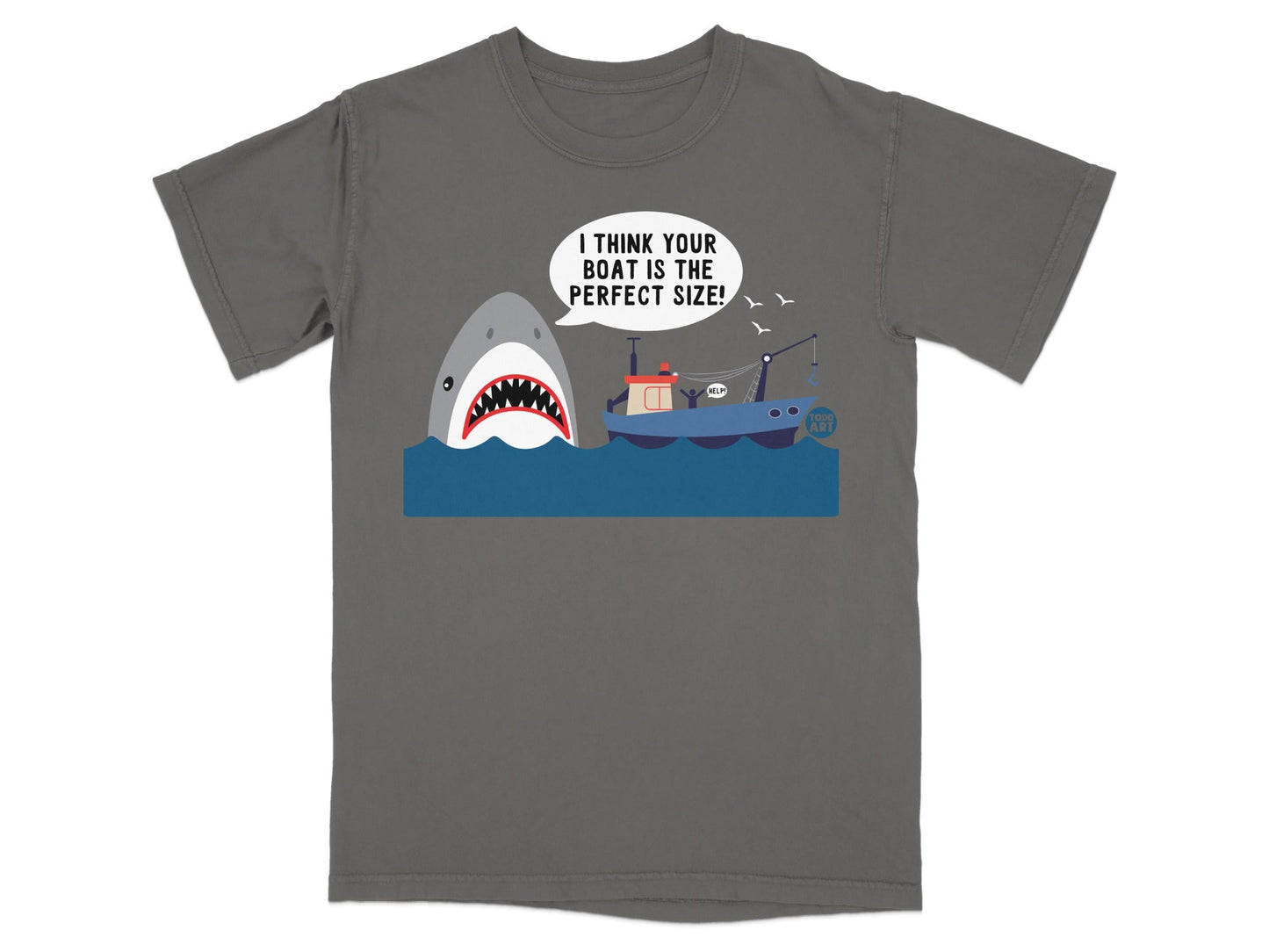 T-shirt graphic: shark approaching a fishing boat with text "I THINK YOUR BOAT IS THE PERFECT SIZE!"