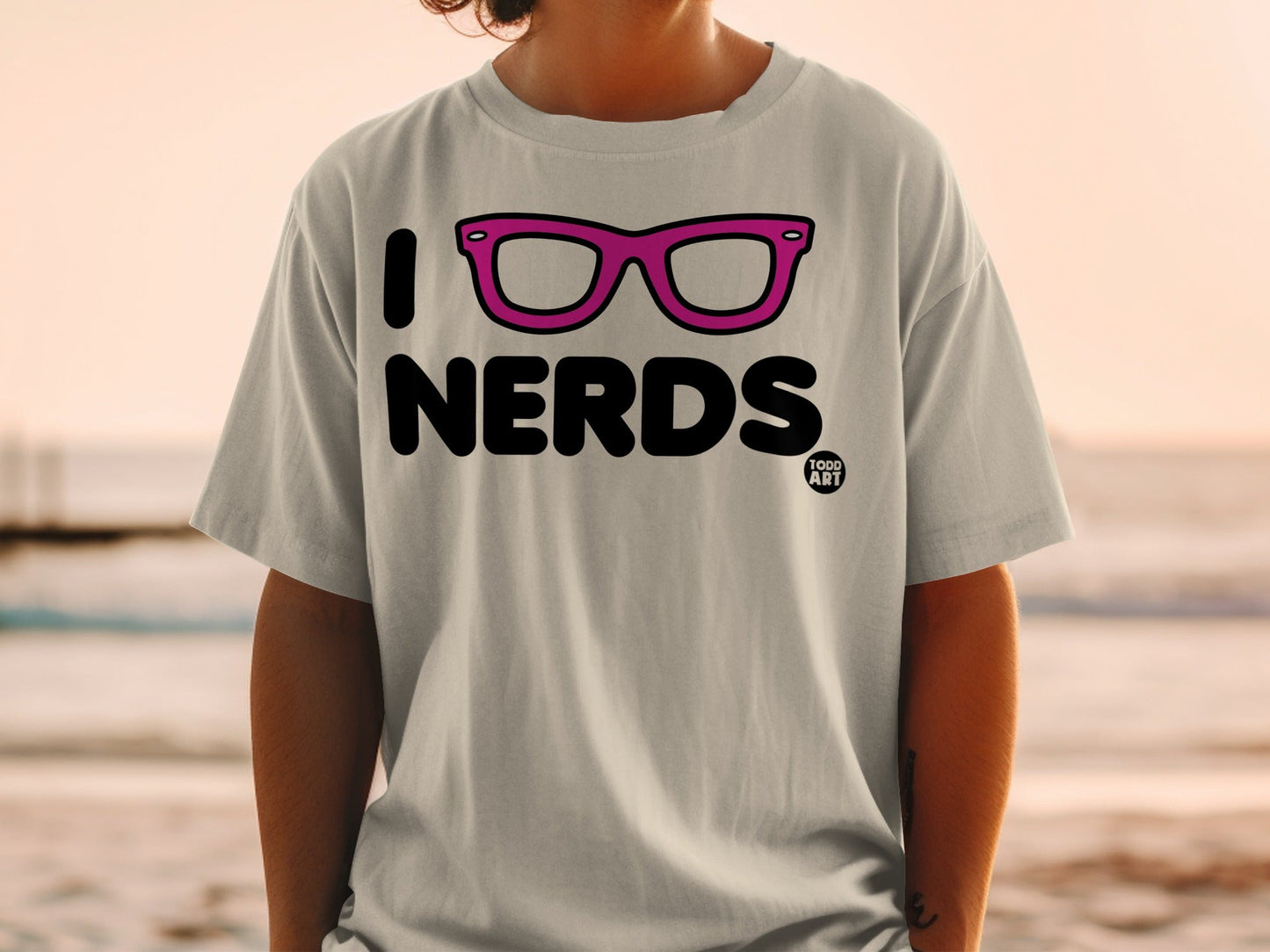 Gray t-shirt with pink framed glasses and text "I <3 NERDS 1000 ART".