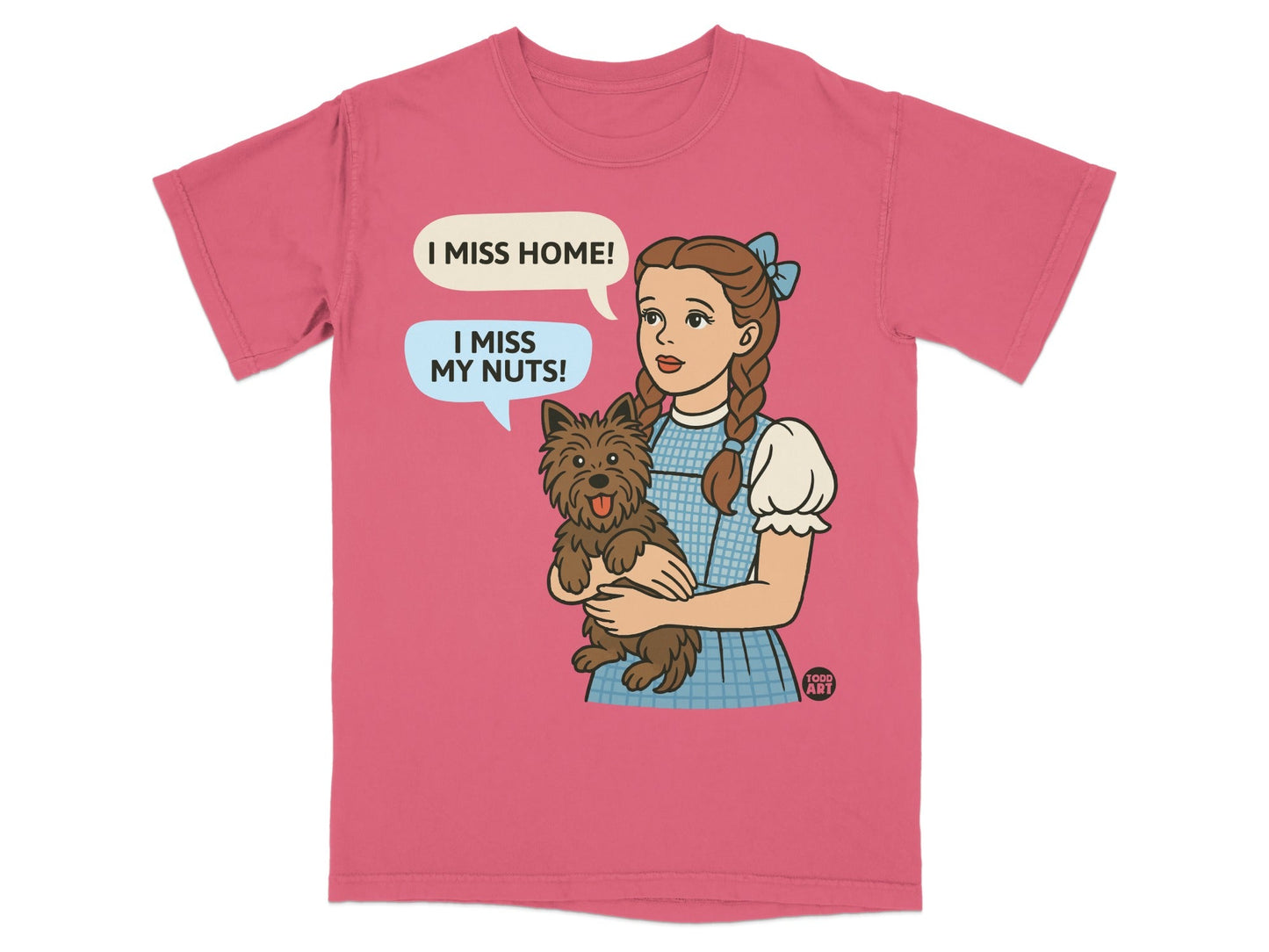 Dorothy holding Toto, with speech bubbles saying "I MISS HOME!" and "I MISS MY NUTS!".
