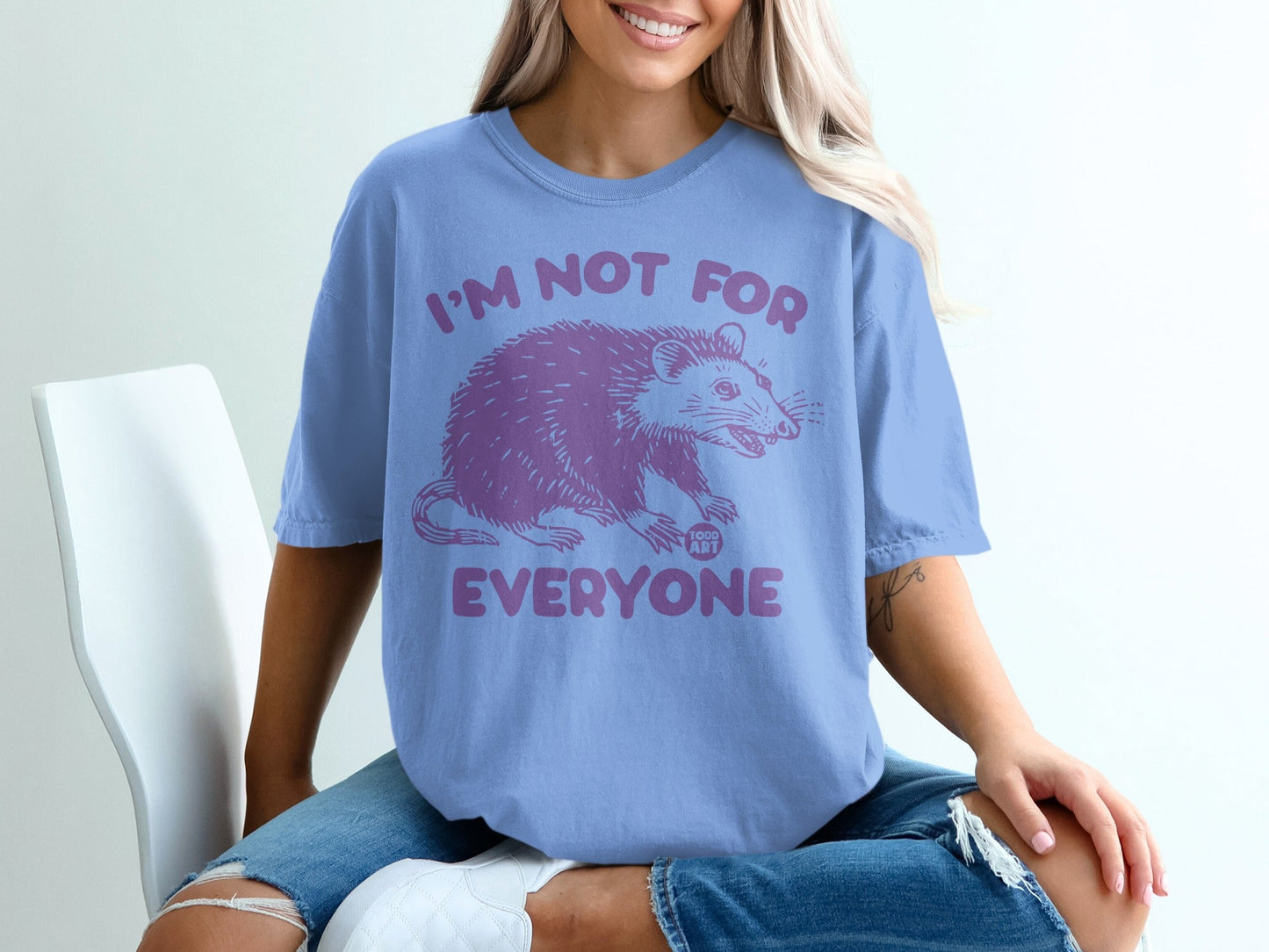 Purple t-shirt with "I'M NOT FOR EVERYONE" and an opossum graphic.