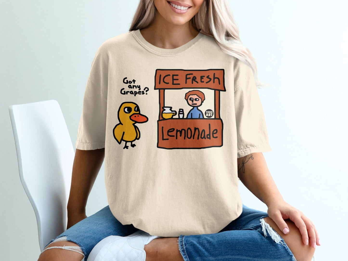 Duck at an ice-cold lemonade stand with "ICE FRESH Lemonade" sign.