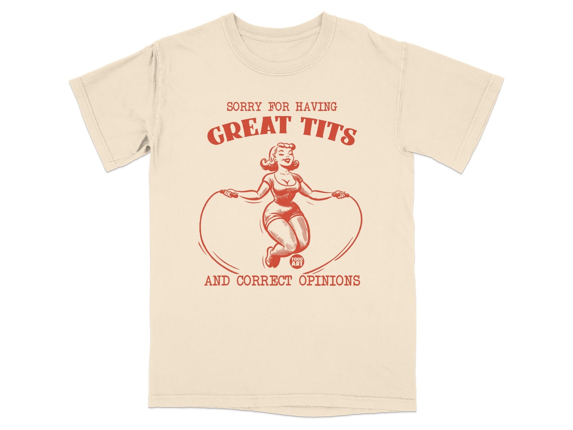 Cream t-shirt with graphic of woman jumping rope and text "SORRY FOR HAVING GREAT TITS AND CORRECT OPINIONS".