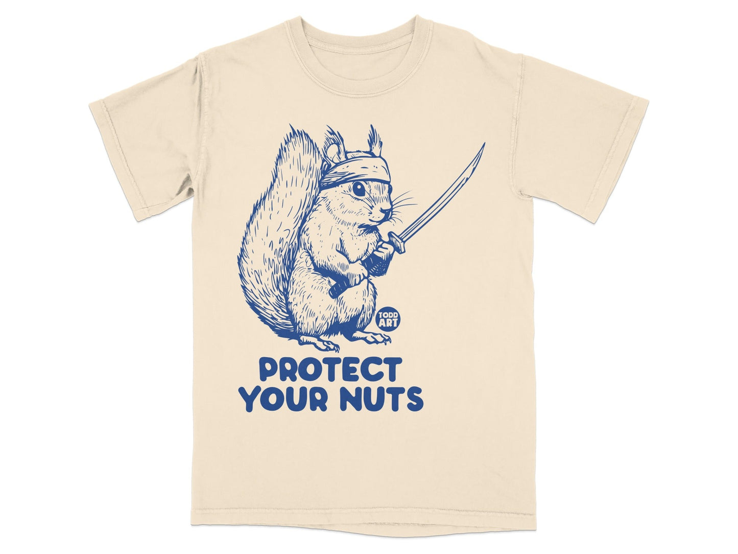 Blue illustration of a squirrel with a bandana and sword on a tan t-shirt.