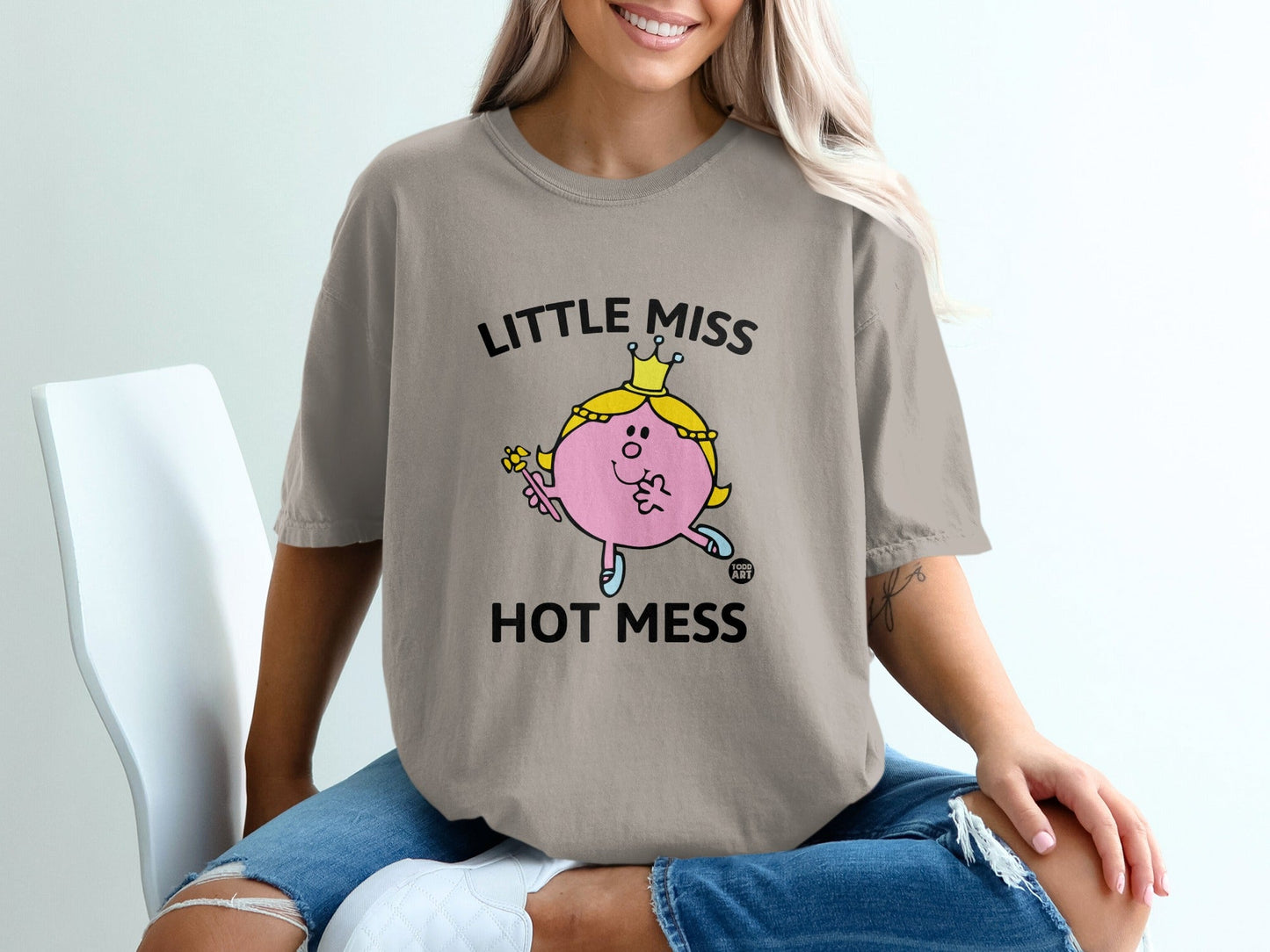 T-shirt with "LITTLE MISS HOT MESS" text and cartoon character.