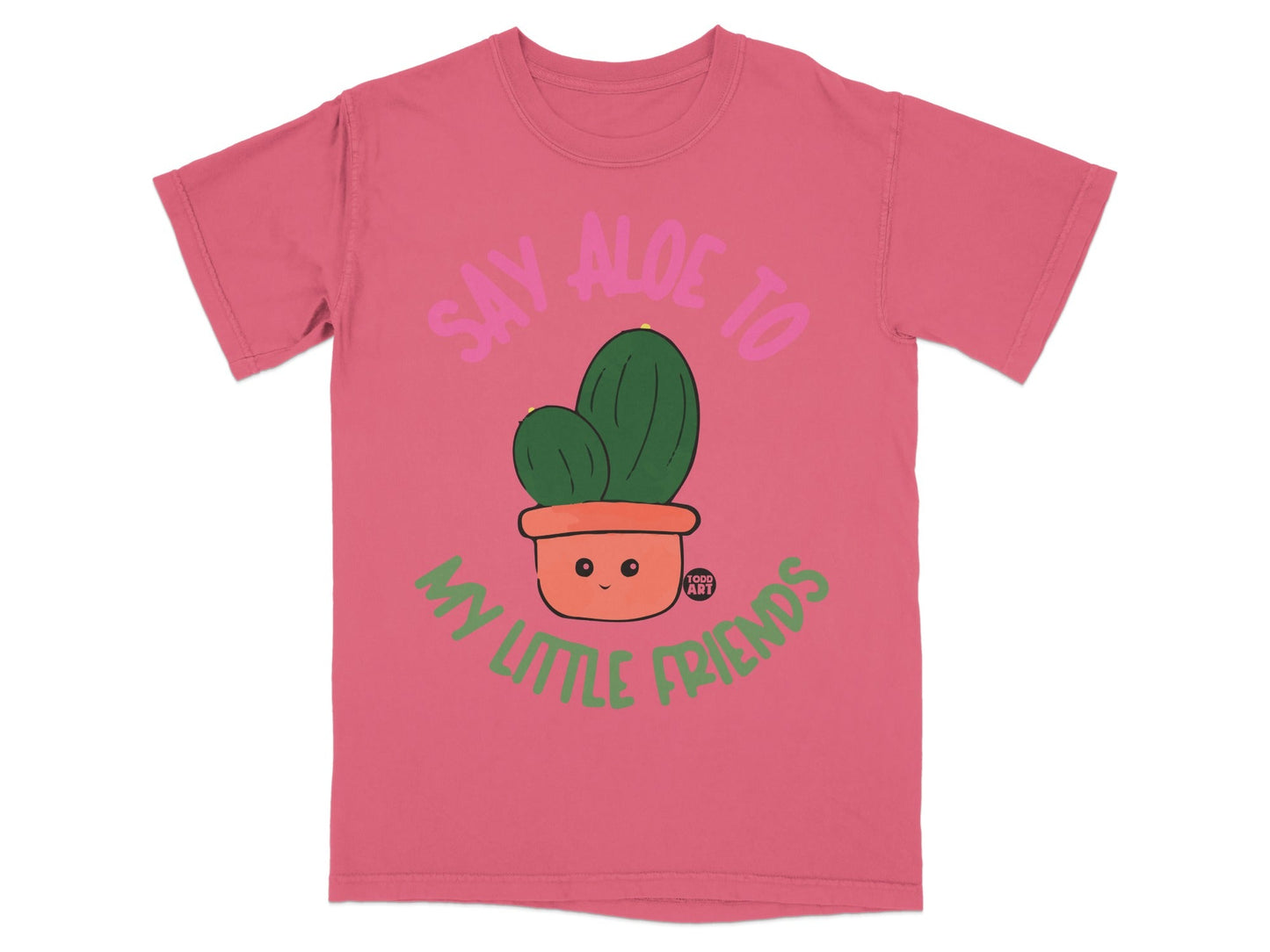 Coral t-shirt with a smiling cactus saying "Say Aloe to My Little Friends".