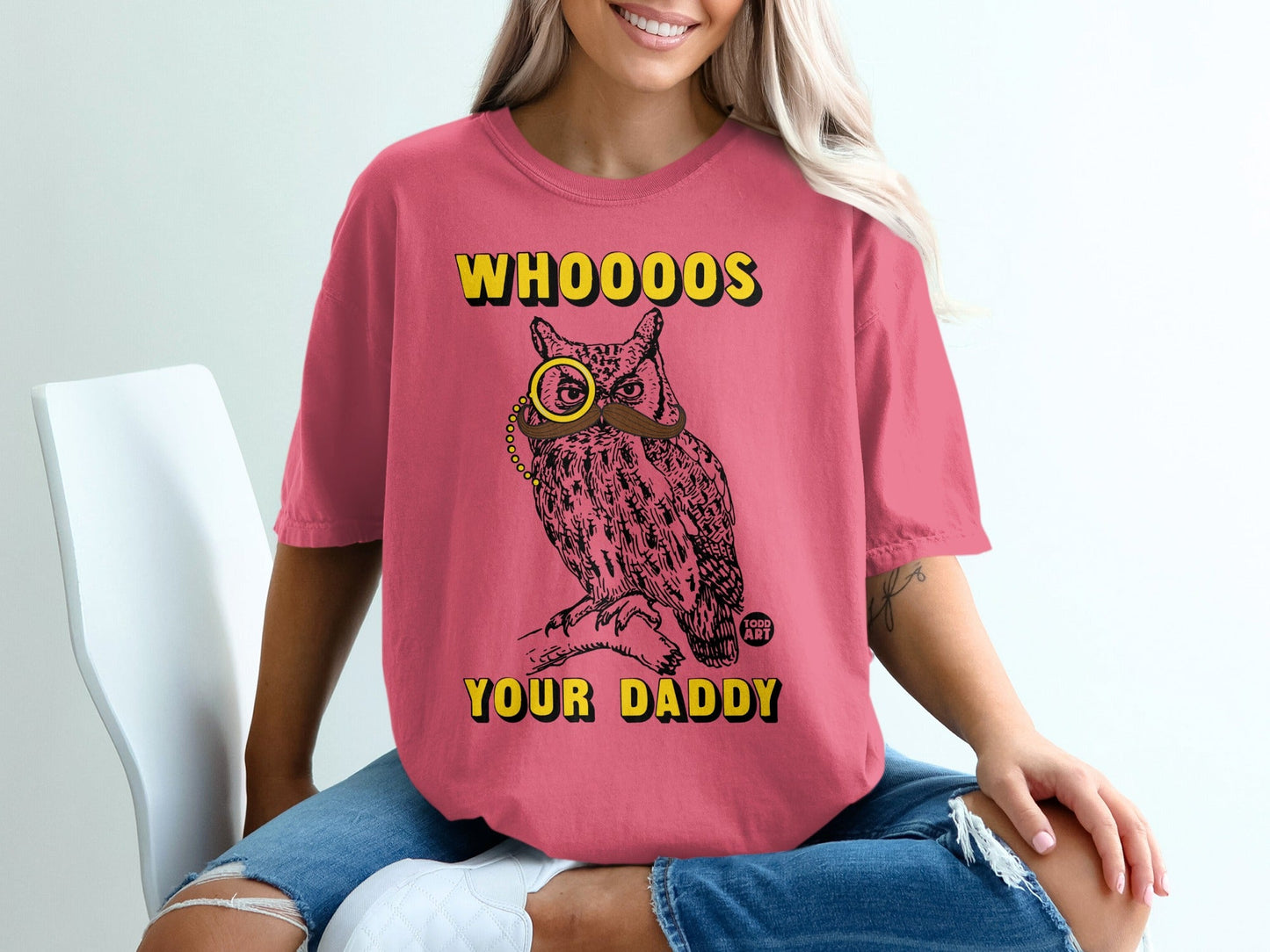 T-shirt with a stylized owl wearing a monocle and mustache, saying "Whoooos your Daddy?"