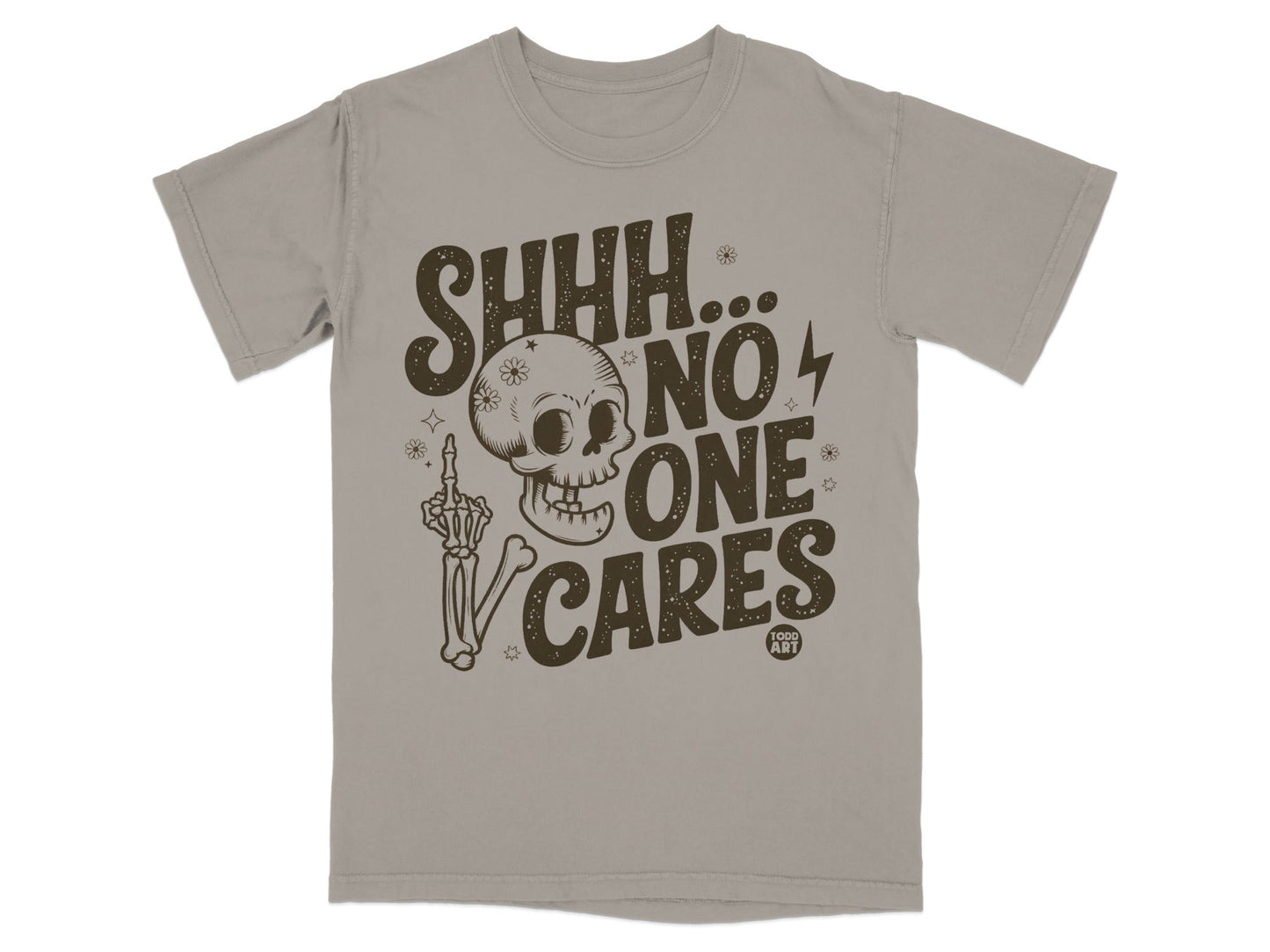 T-shirt with "SHHH... NO ONE CARES" and skull graphic.