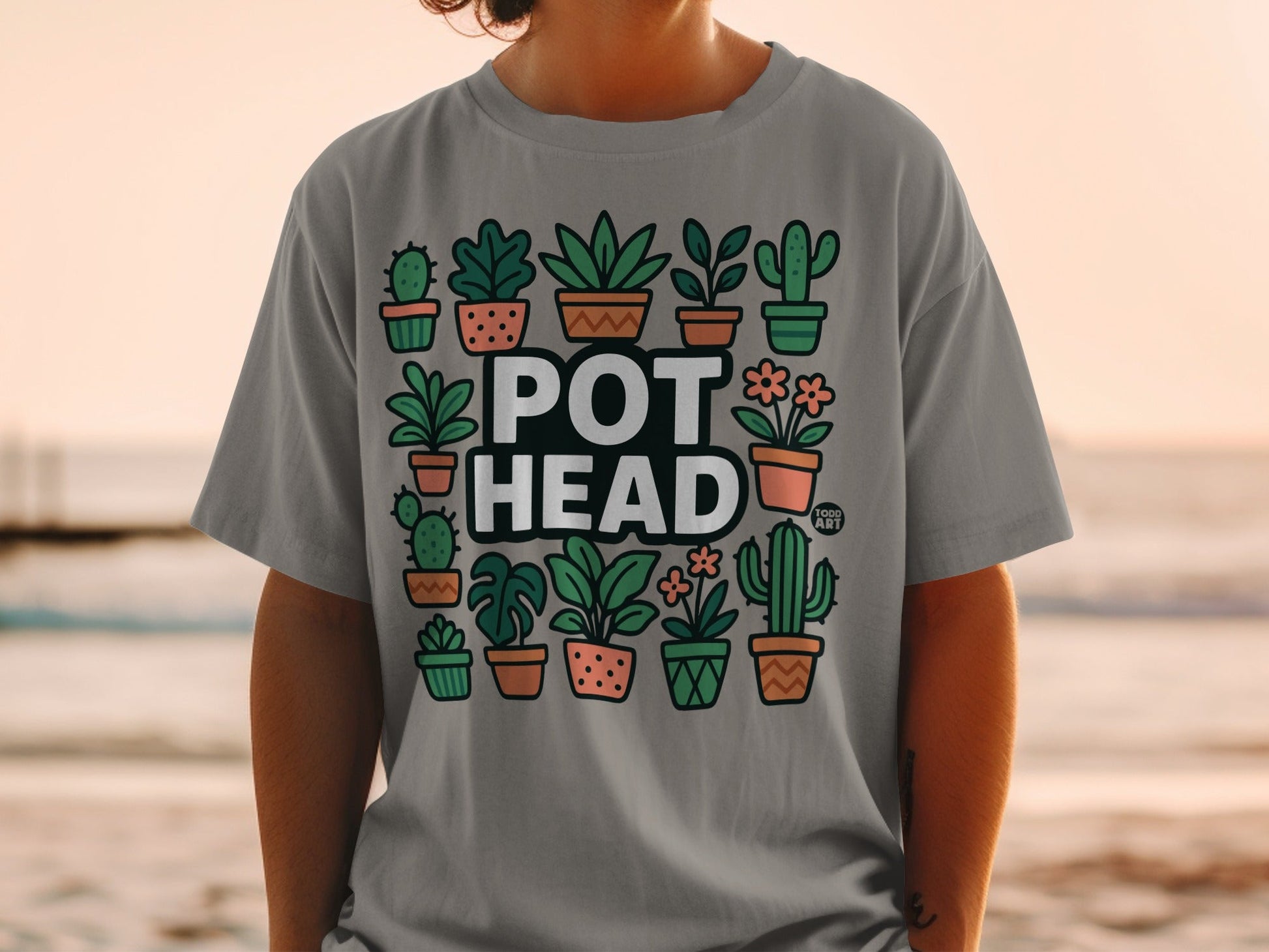 Grey t-shirt with potted plants and "POT HEAD" text.