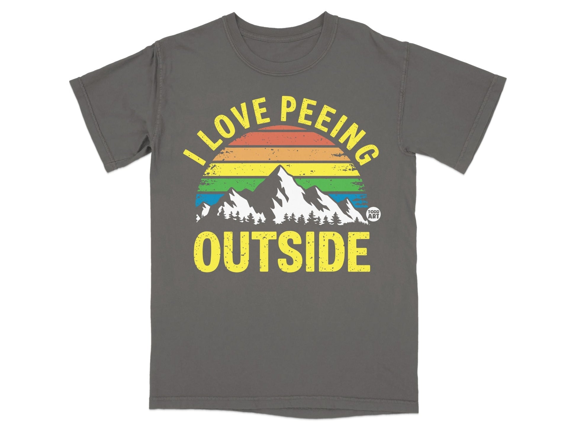 T-shirt with text "I love peeing OUTSIDE" over a rainbow and mountains.