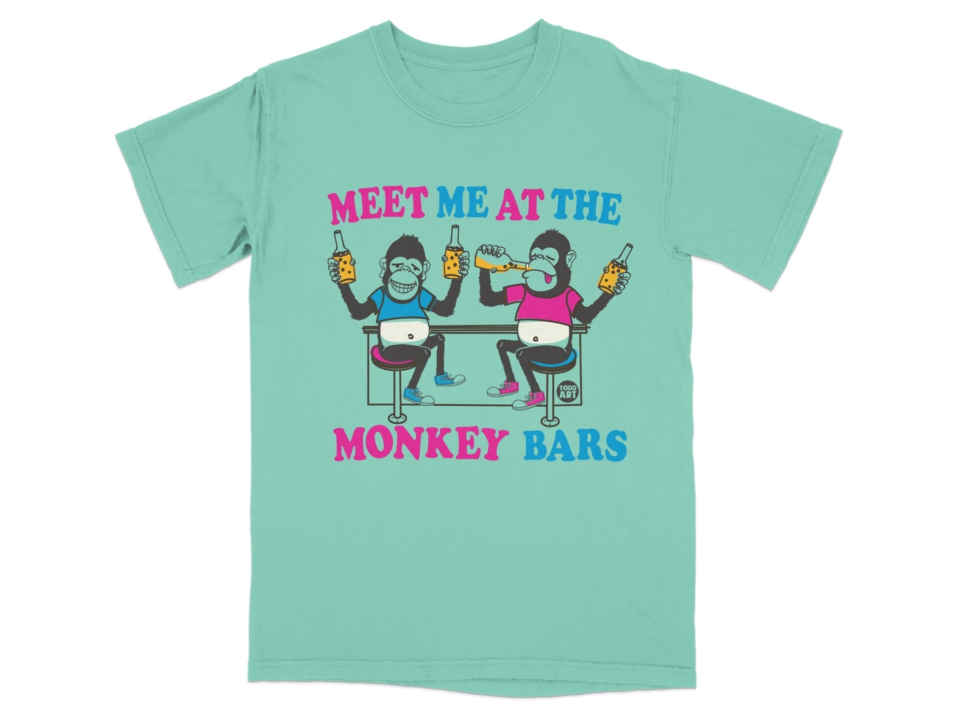 T-shirt graphic with two monkeys sitting at a bar, text reads "Meet Me at the Monkey Bars."
