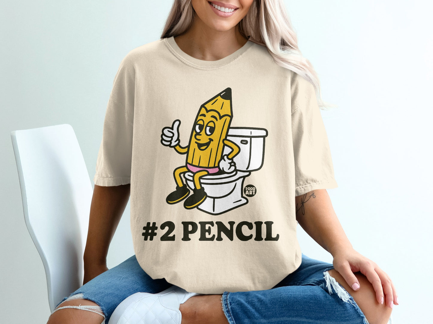 Cartoon #2 pencil giving a thumbs-up from atop a toilet.