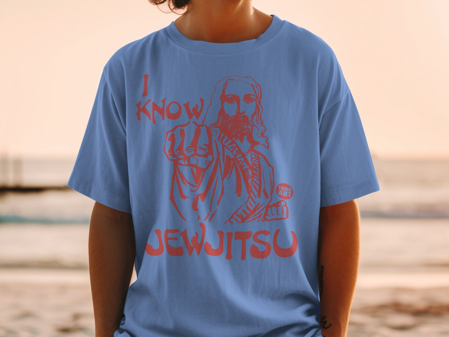 Blue t-shirt with "I KNOW JEWJITSU" and Jesus pointing forward.