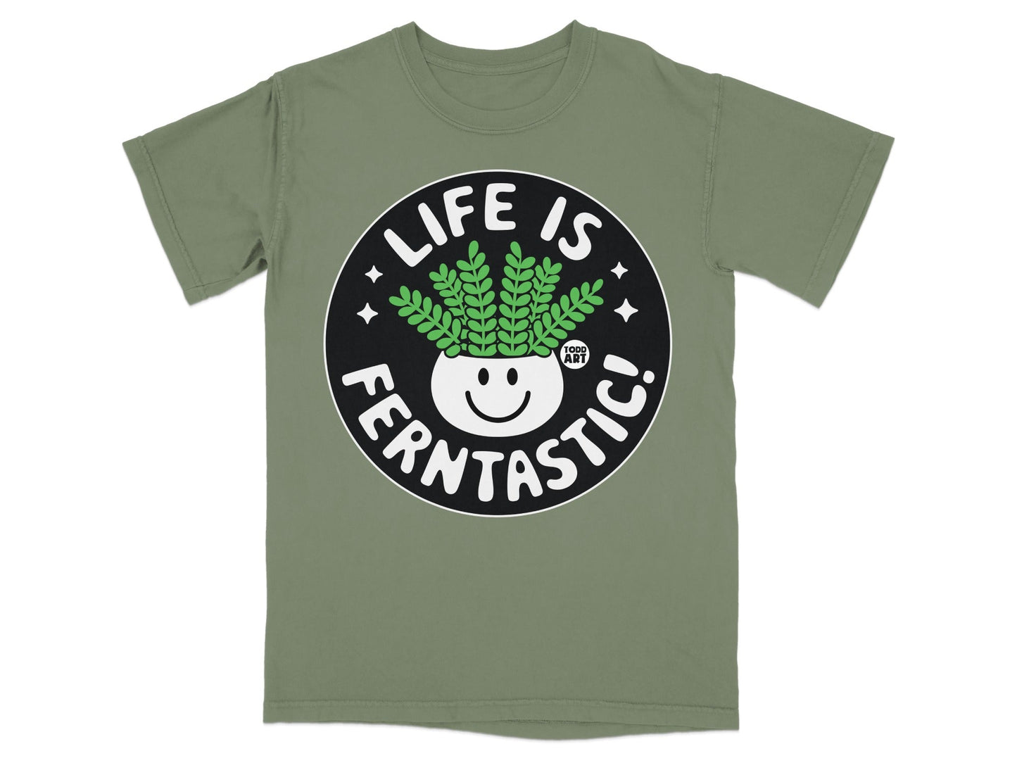 Green t-shirt with "LIFE IS FERNTASITIC!" text and smiling potted plant.