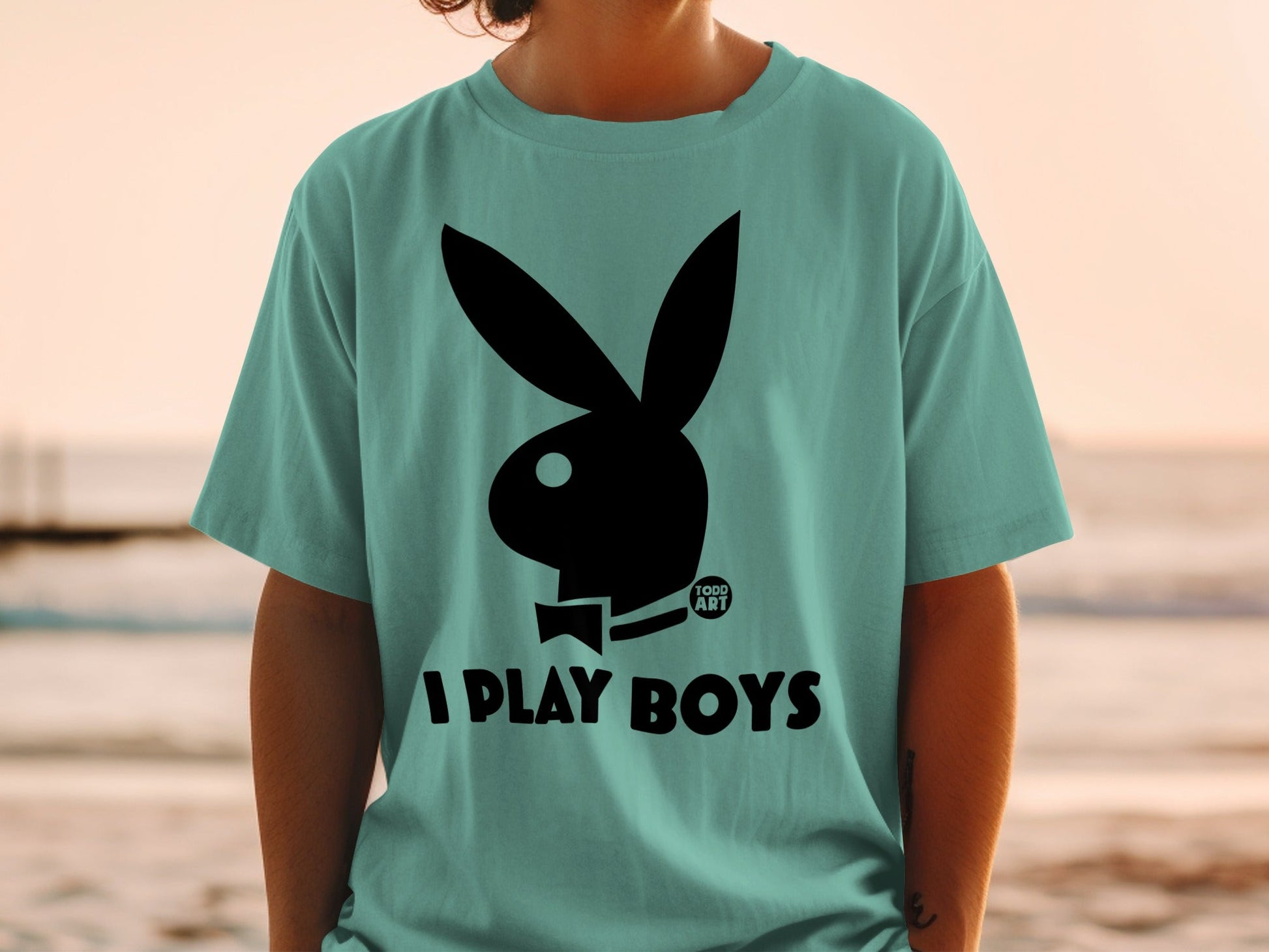 Teal t-shirt with black Playboy bunny logo and "I PLAY BOYS" text.