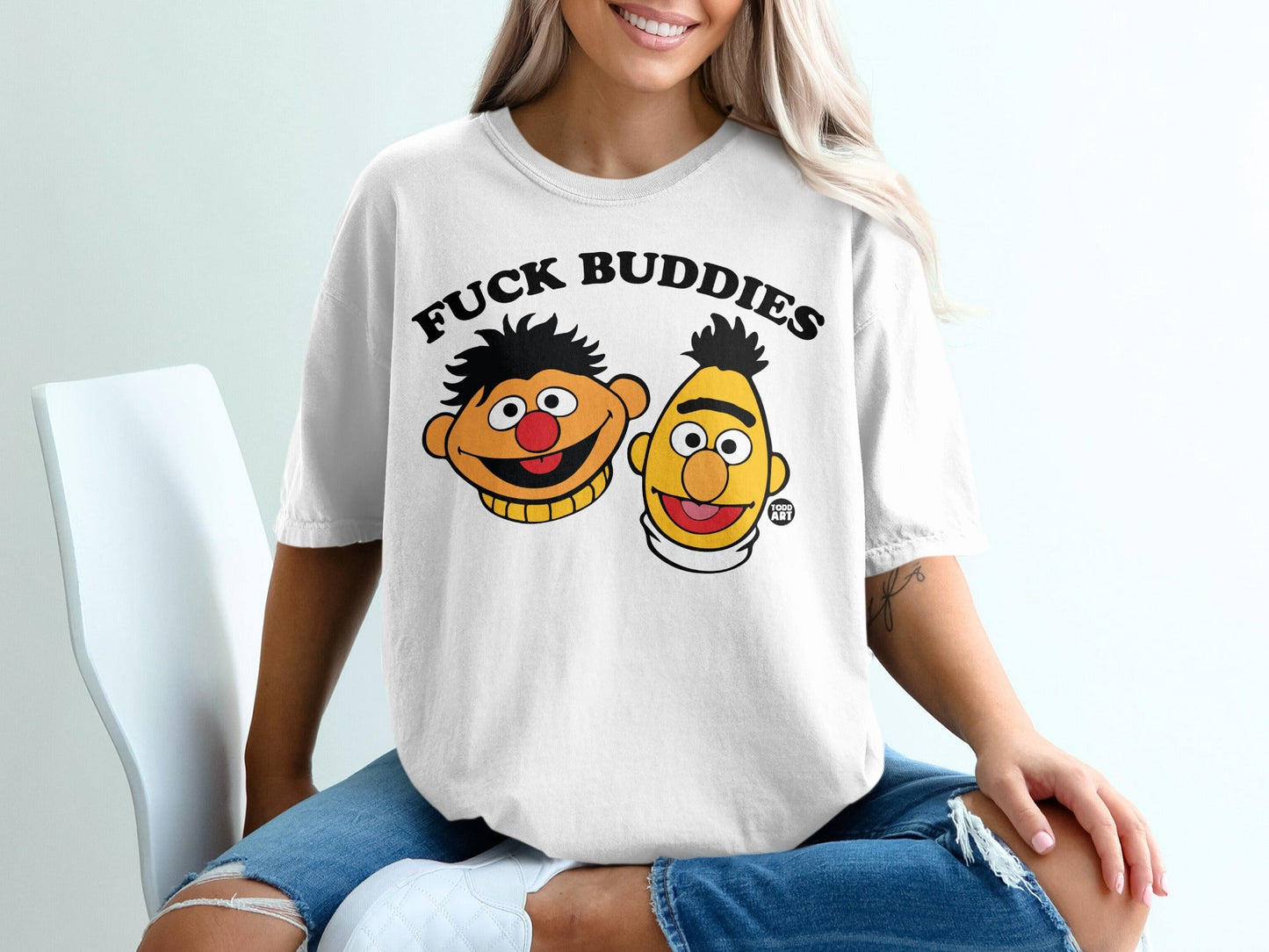 Bert and Ernie characters with "FUCK BUDDIES" text on a white t-shirt.