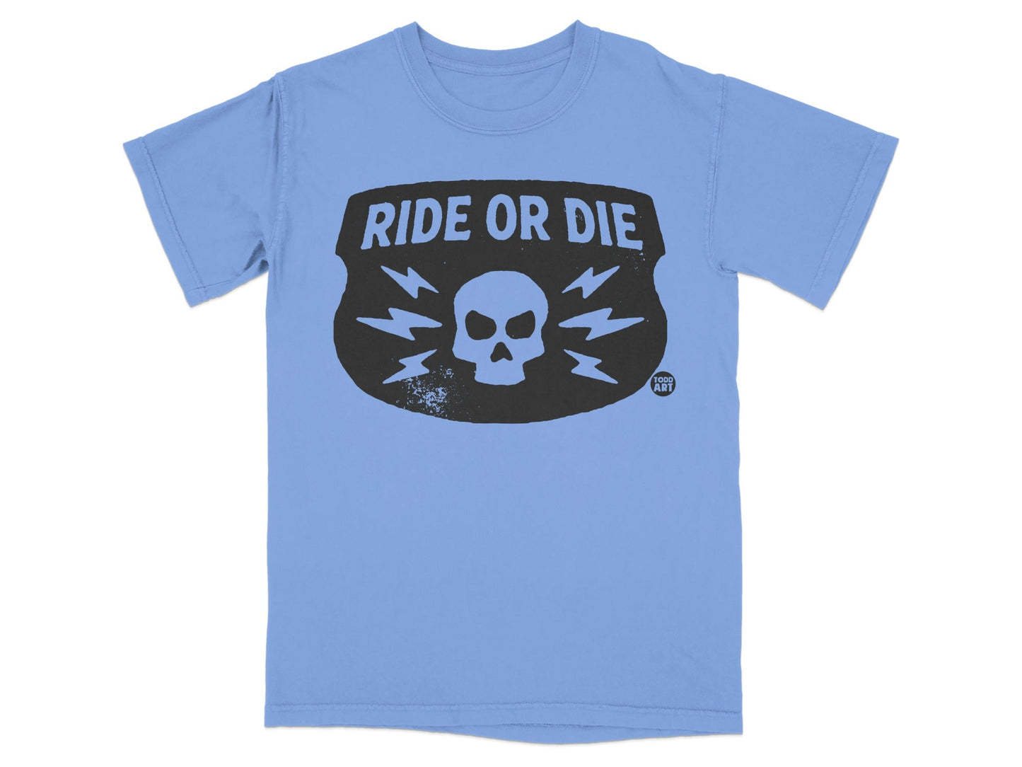 Light blue t-shirt with black "RIDE OR DIE" shield logo and skull.