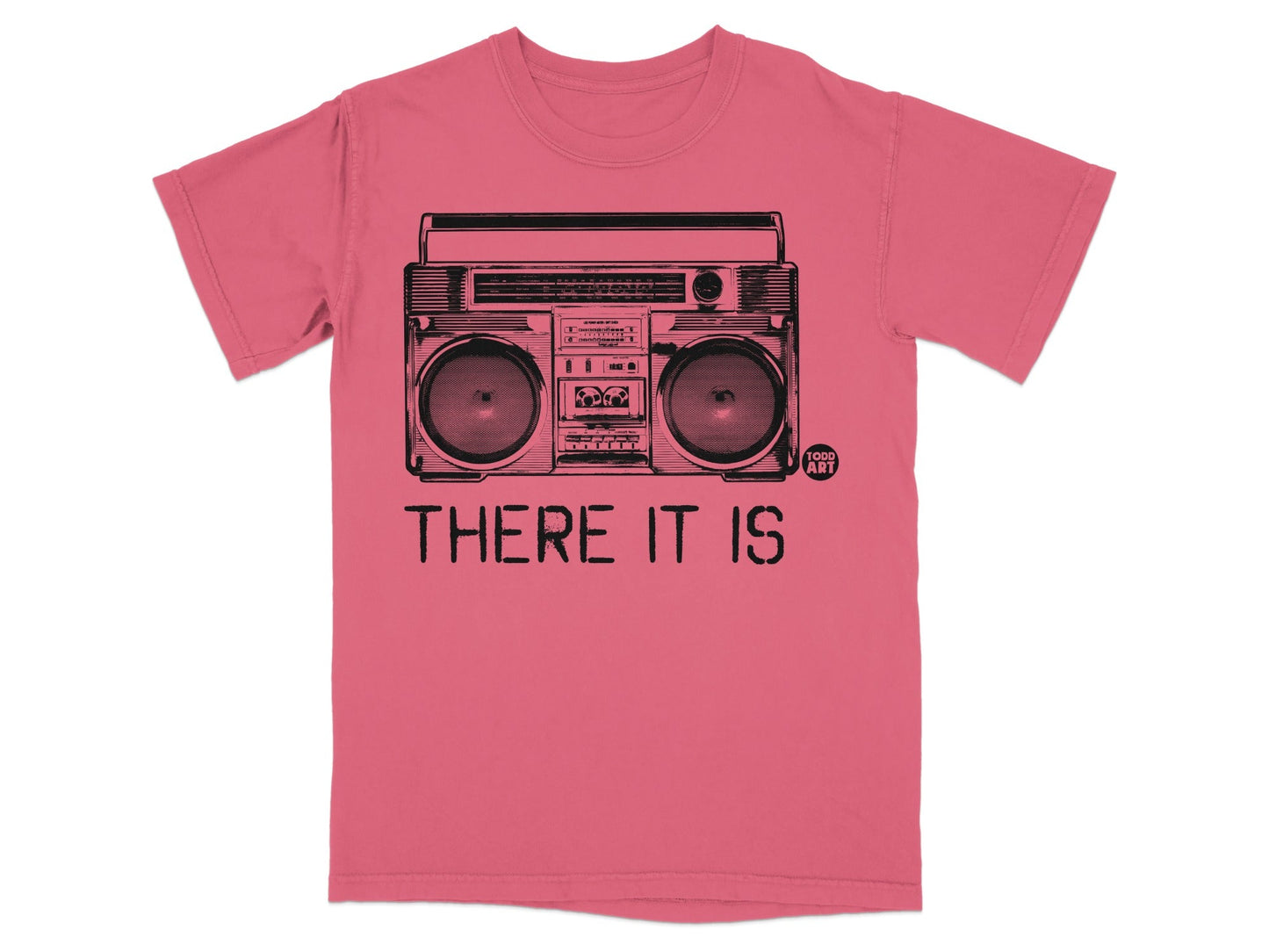 Coral t-shirt with a black illustration of a boombox and text "THERE IT IS".