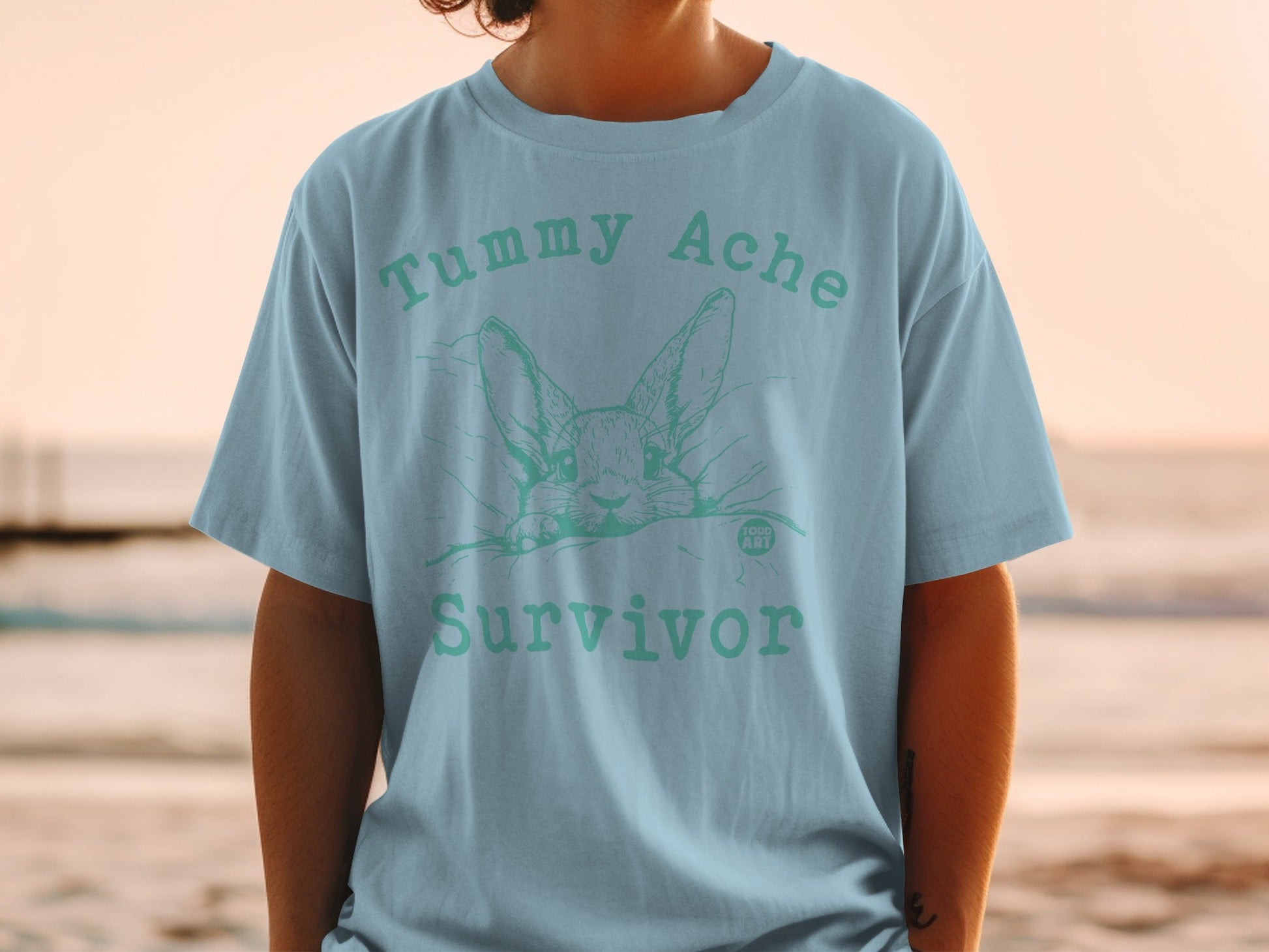 Tummy Ache Survivor Graphic T-Shirt Todd Art Design