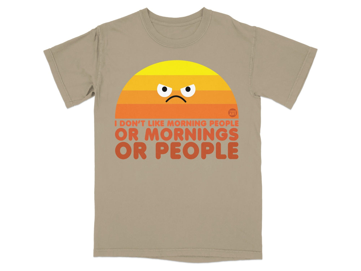 Tan t-shirt with grumpy sun graphic and text "I DON'T LIKE MORNING PEOPLE OR MORNINGS OR PEOPLE".