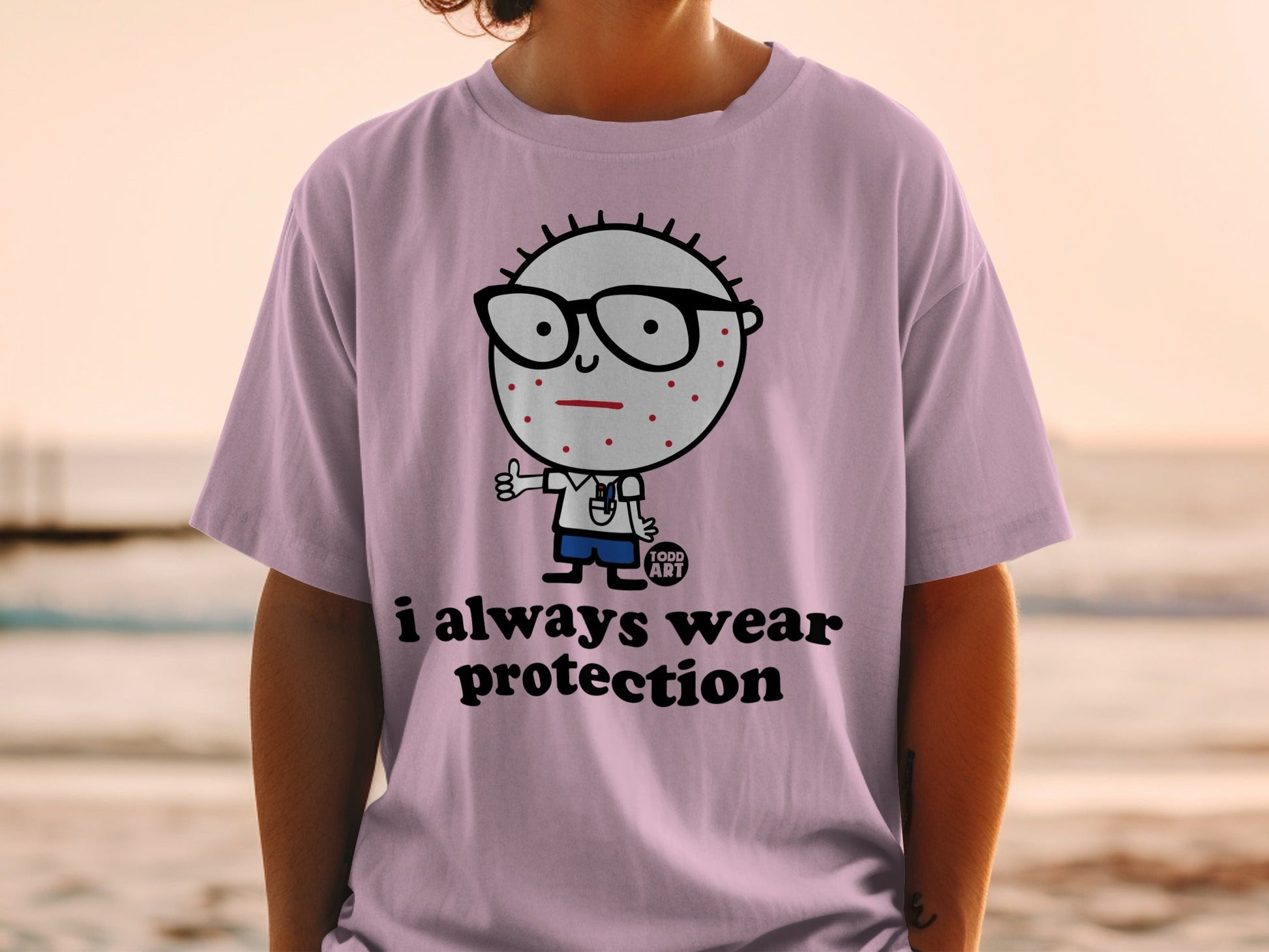 T-shirt with cartoon character wearing glasses and text "i always wear protection."