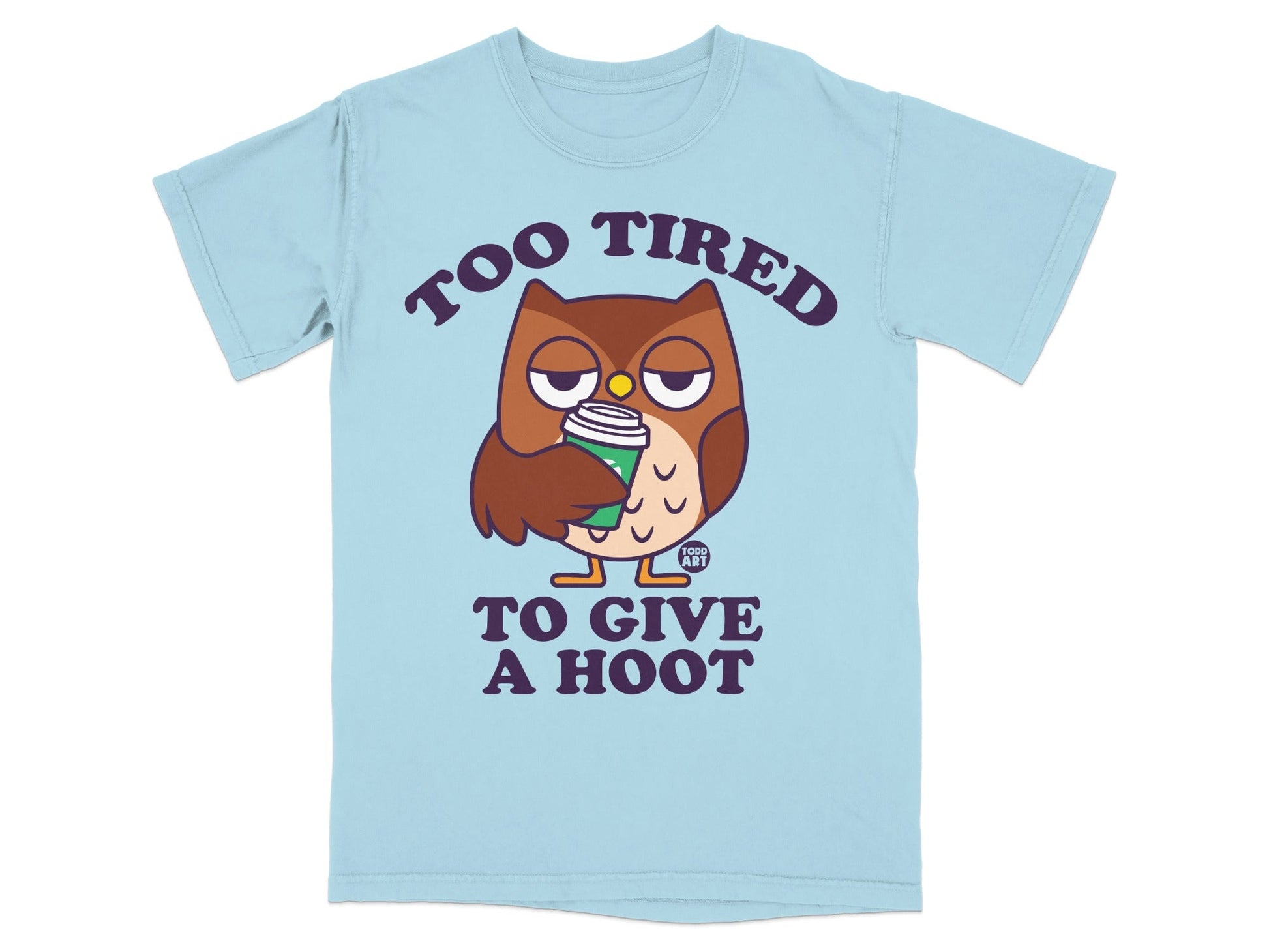 Light blue t-shirt with a cartoon owl holding a coffee cup, text "TOO TIRED TO GIVE A HOOT".