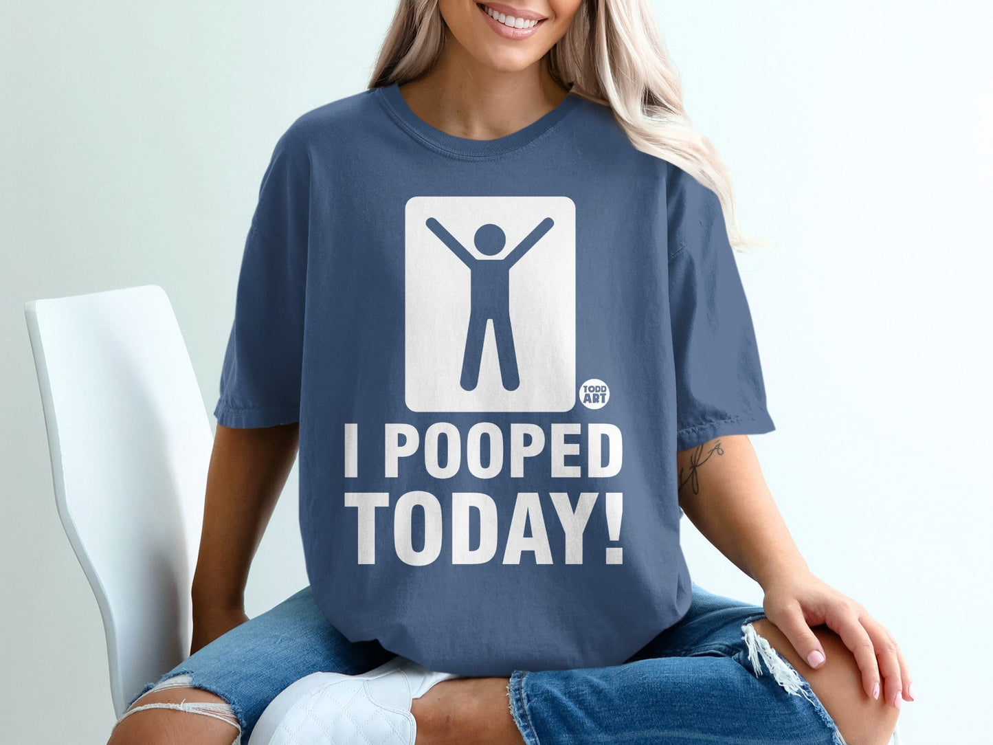 Blue t-shirt with white graphic and text "I POOPED TODAY!"