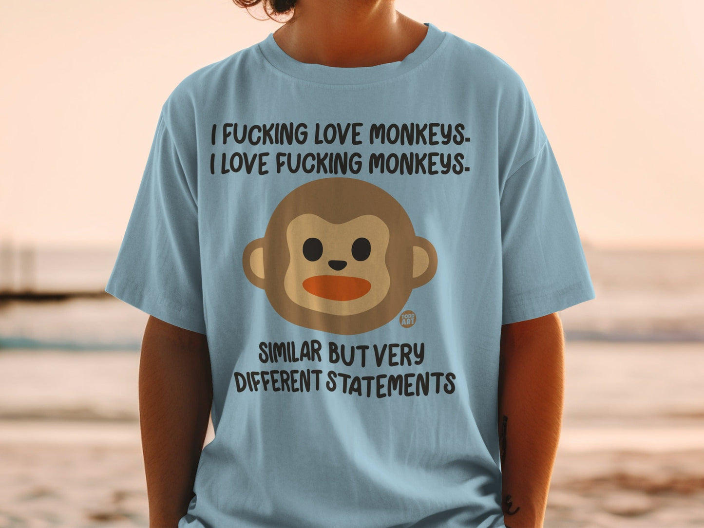 Light blue t-shirt with monkey graphic and text about loving monkeys.