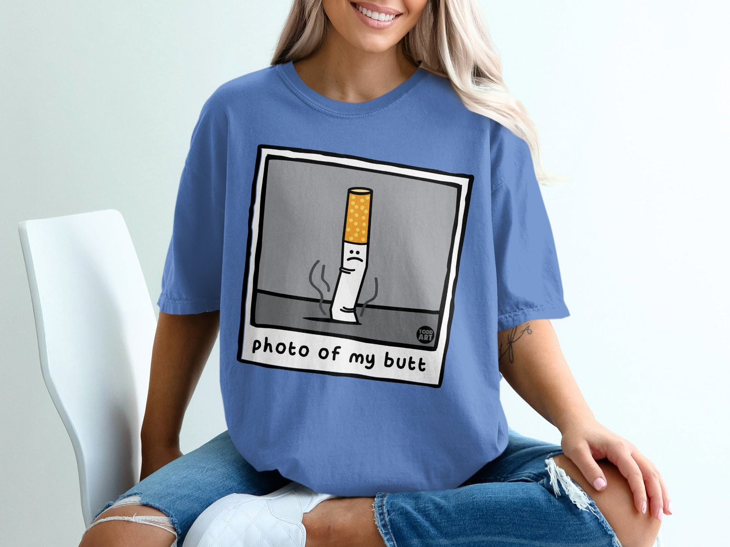 T-shirt with cartoon cigarette and text "photo of my butt".