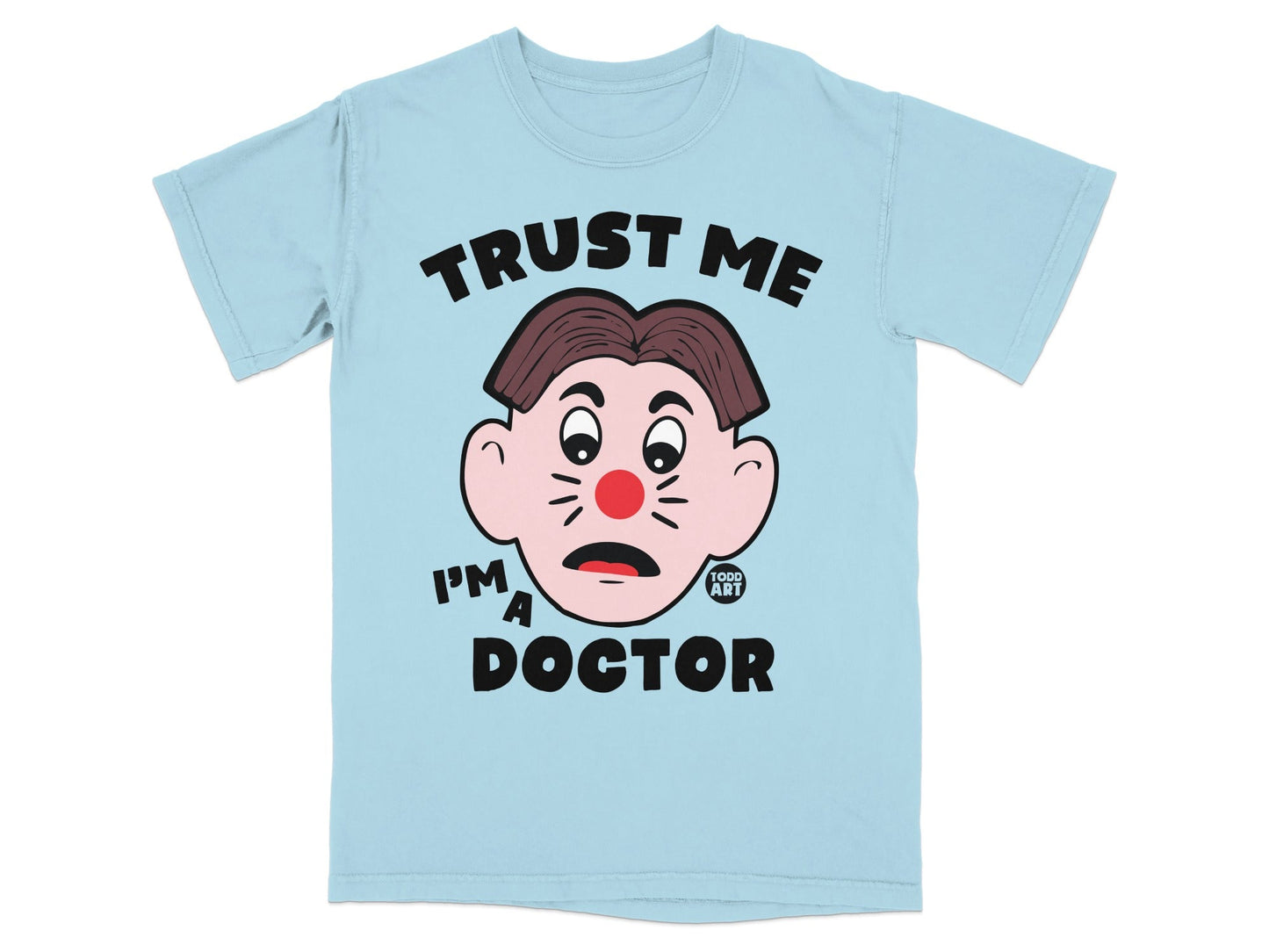 Light blue t-shirt with a cartoon doctor face and "Trust Me I'm A Doctor" text.