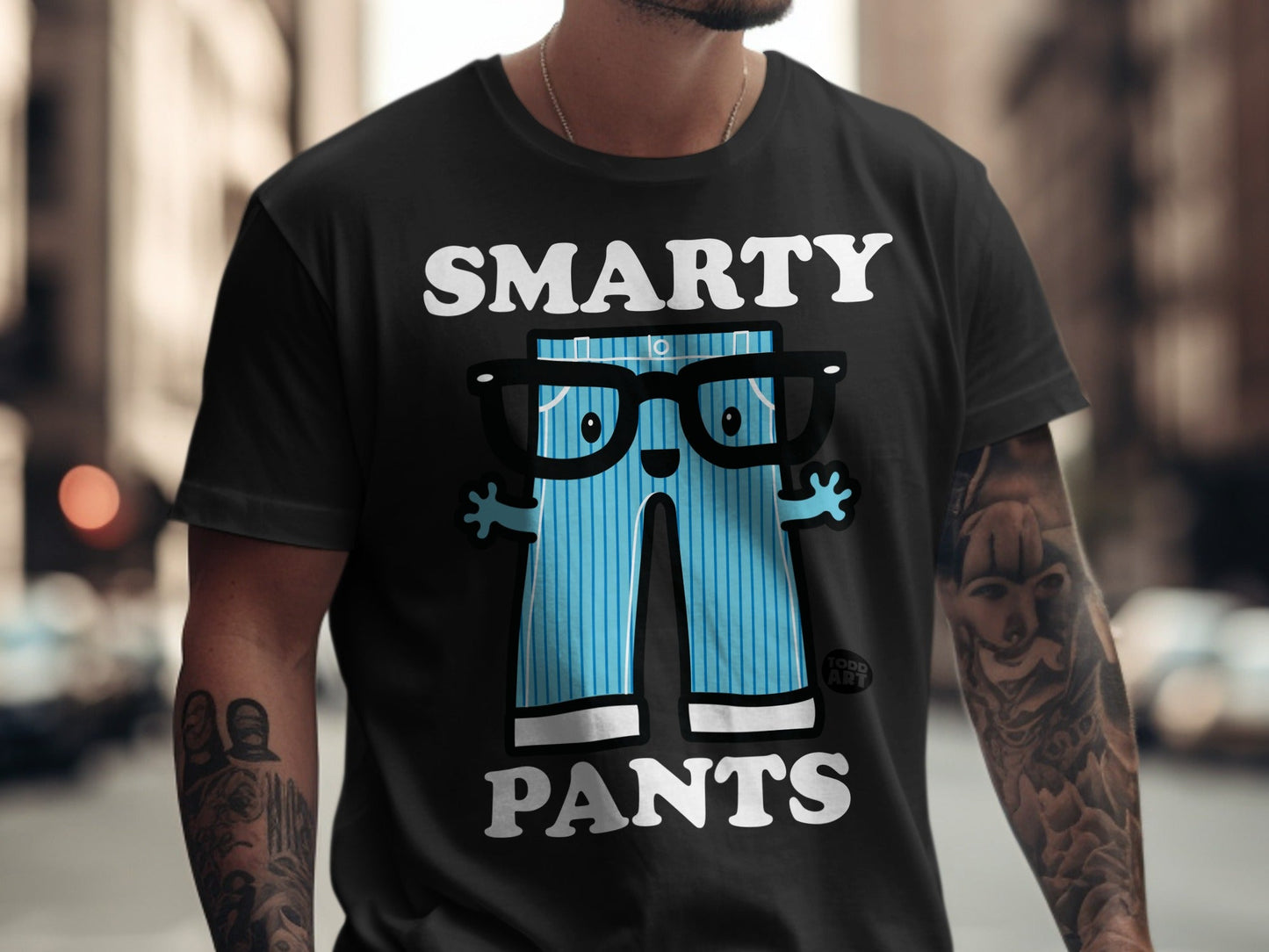 Black t-shirt with "SMARTY PANTS" text and illustrated blue pants with glasses.