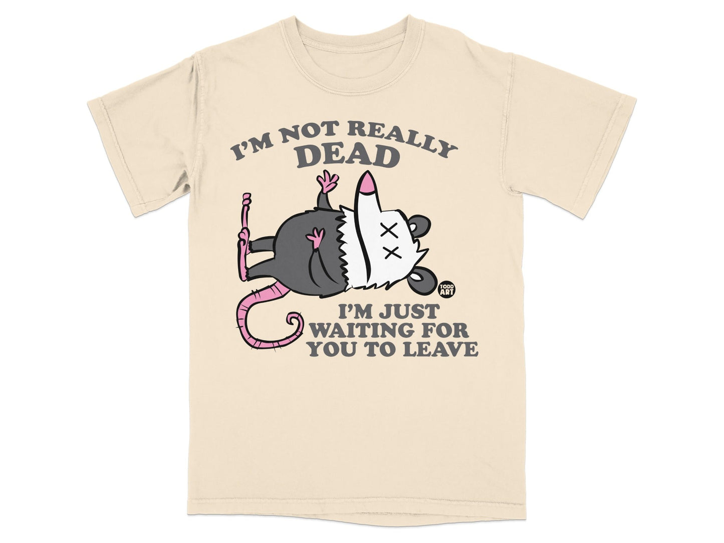 Beige t-shirt with a possum playing dead and text reading "I'm not really dead, I'm just waiting for you to leave."