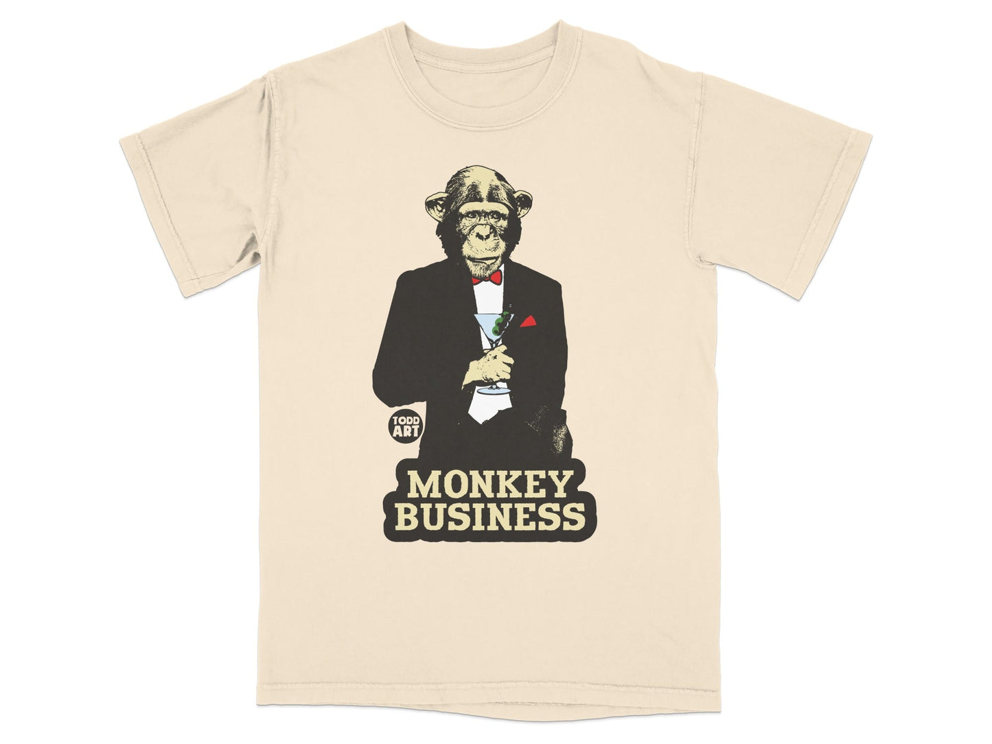 T-shirt with a chimpanzee in a tuxedo holding a martini, text reads "MONKEY BUSINESS".