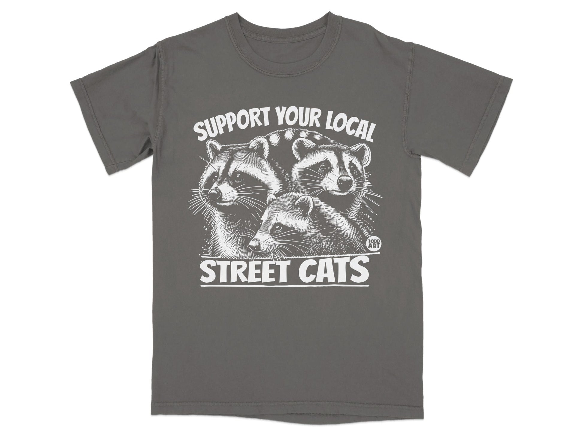 T-shirt graphic with three raccoons and "SUPPORT YOUR LOCAL STREET CATS" text.