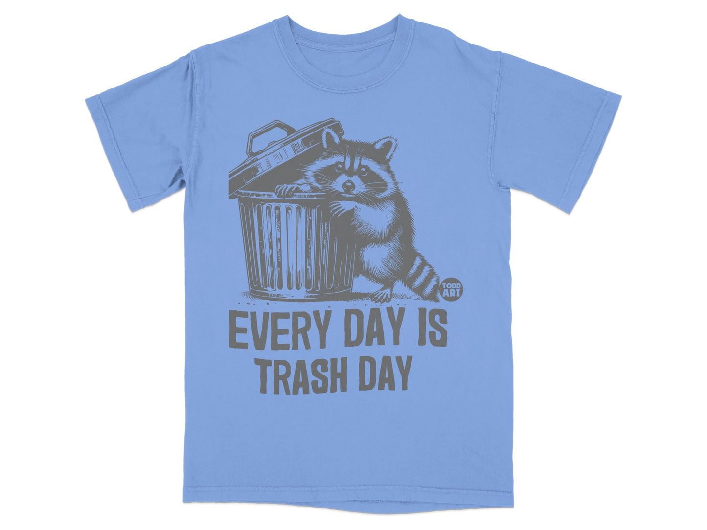 T-shirt with raccoon peeking out of trash can, text "EVERY DAY IS TRASH DAY".