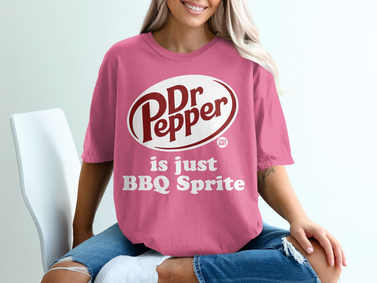 Pink t-shirt with Dr Pepper logo and "is just BBQ Sprite" text.